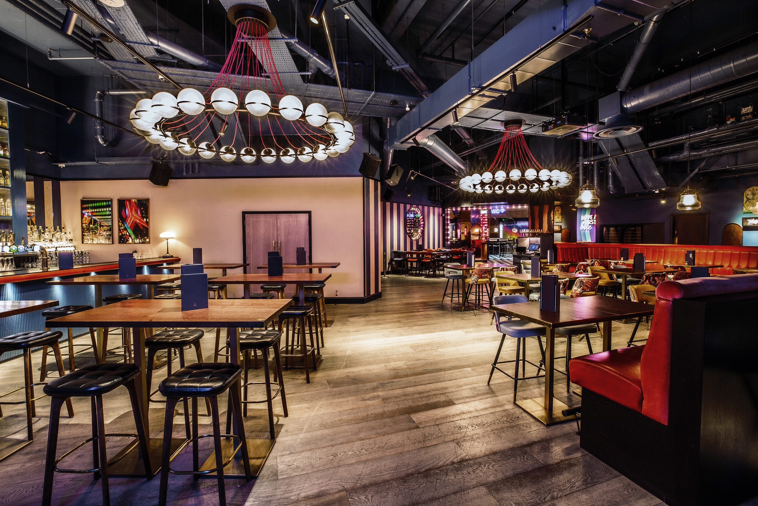 Modern event space at Puttshack Bank with stylish lighting for corporate and social events.