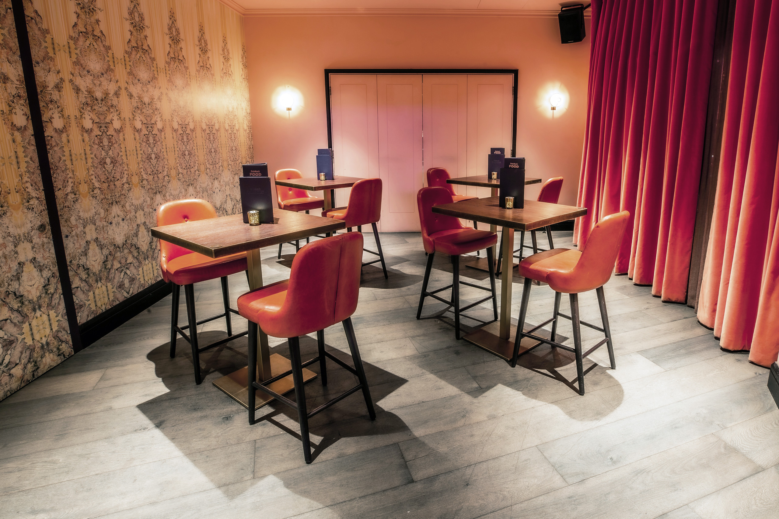 Stylish Rose Private Room at Puttshack Bank, ideal for networking events and gatherings.