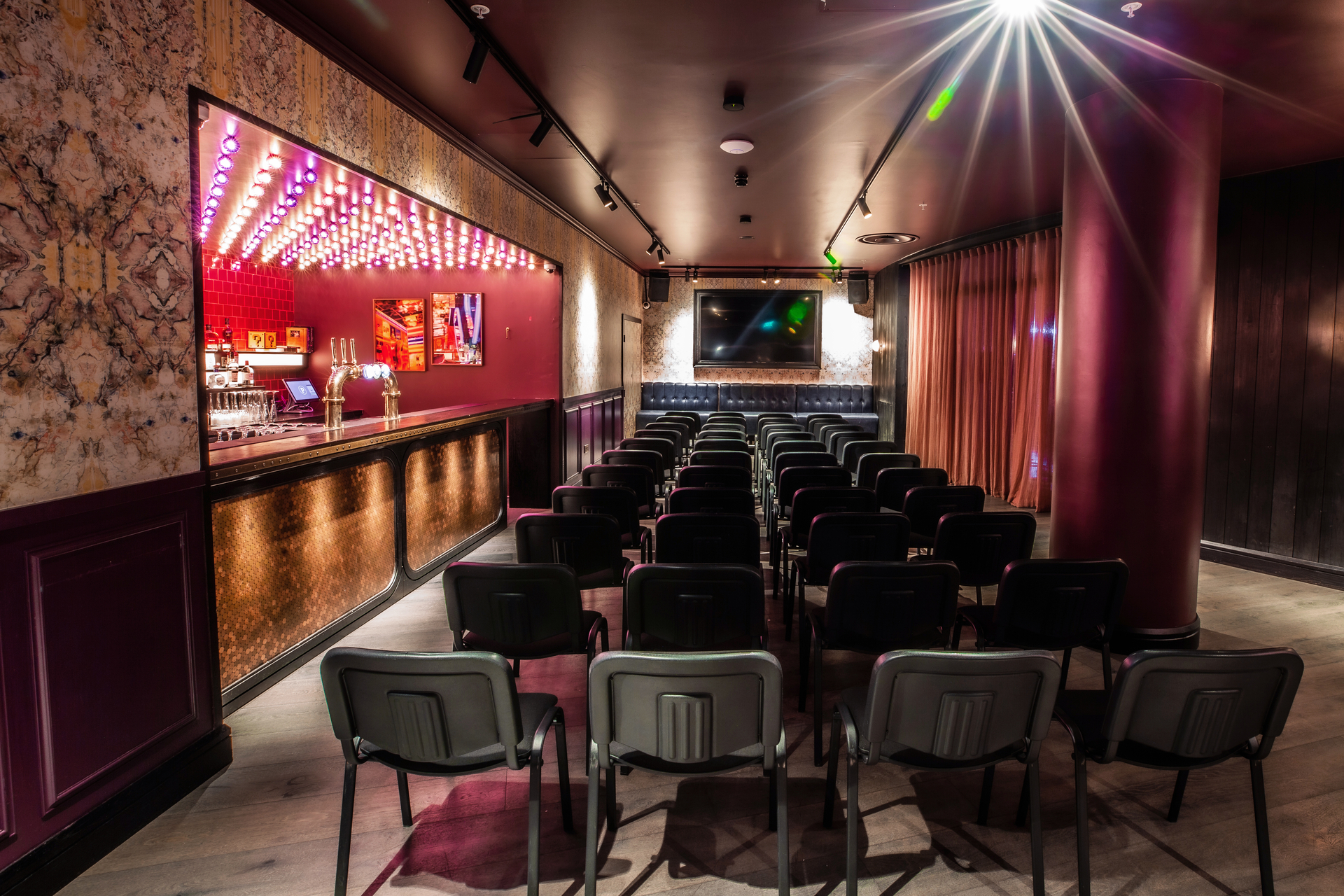 Stylish Ruby Private Room at Puttshack Bank for intimate events and workshops.