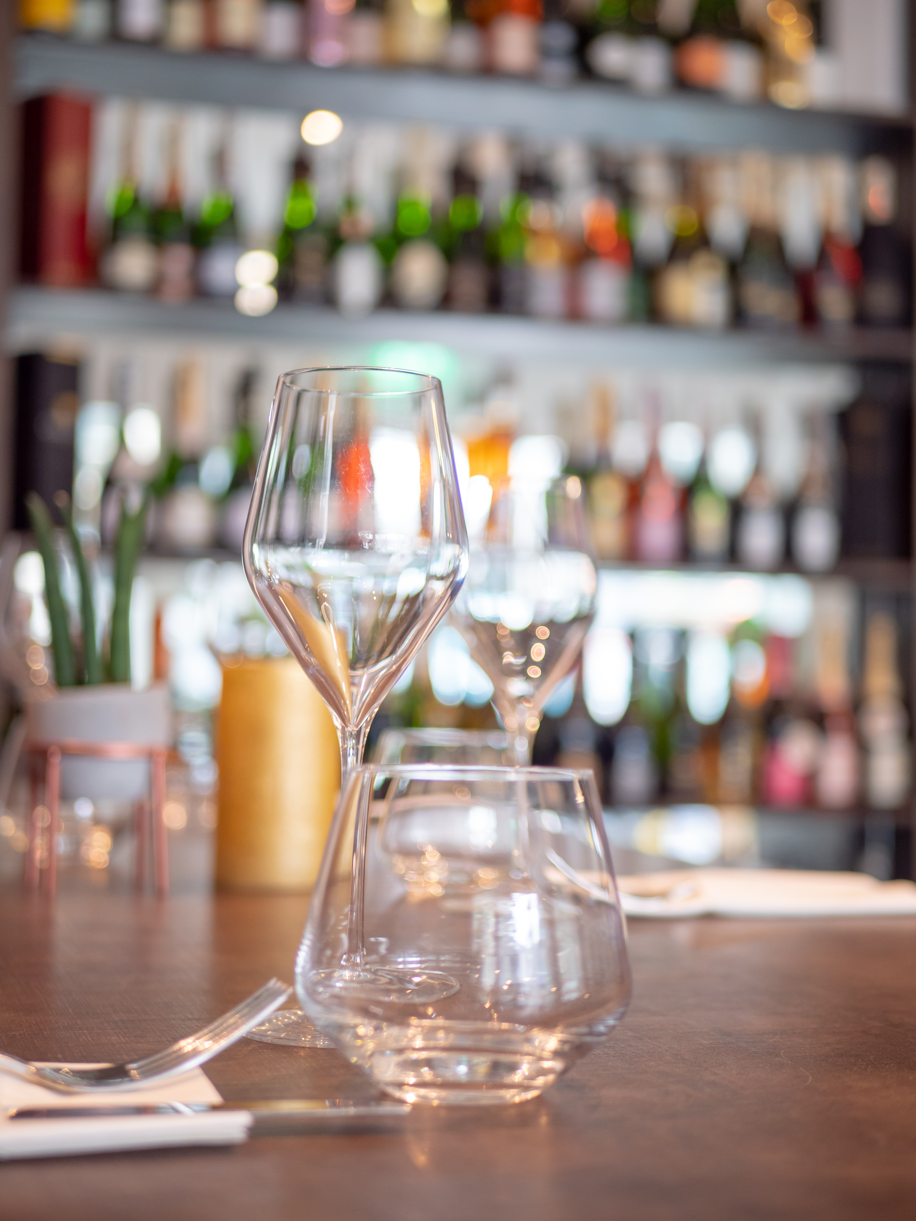 Elegant venue with fine glassware for wine tasting and networking events.