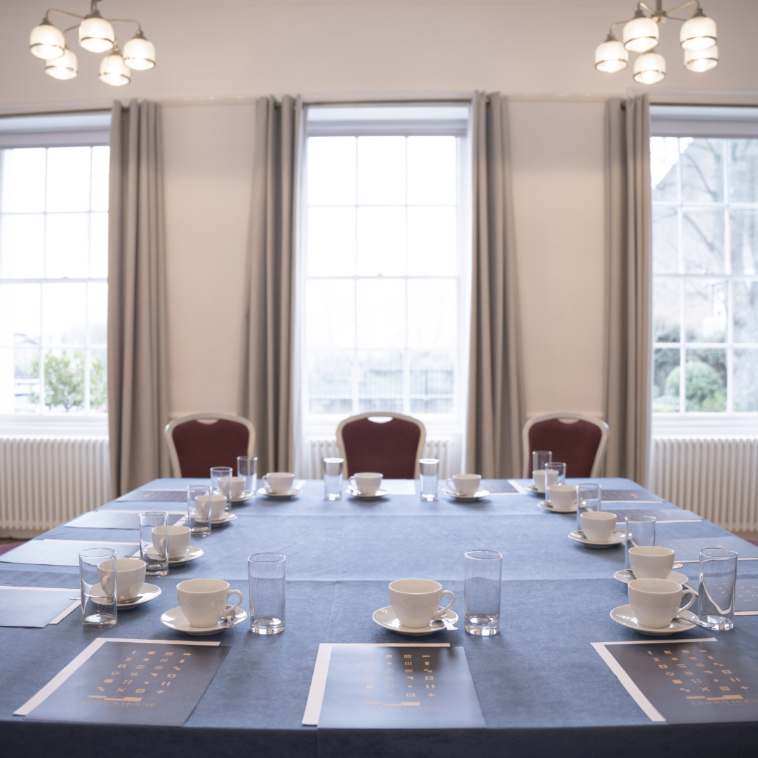 Captains Room at Linden House, roundtable setup for professional meetings and networking.