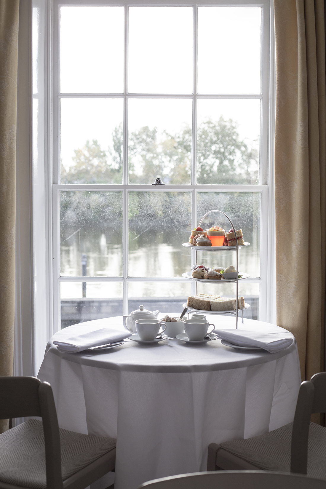 Elegant afternoon tea setup in Commodores Room, Linden House for networking events.