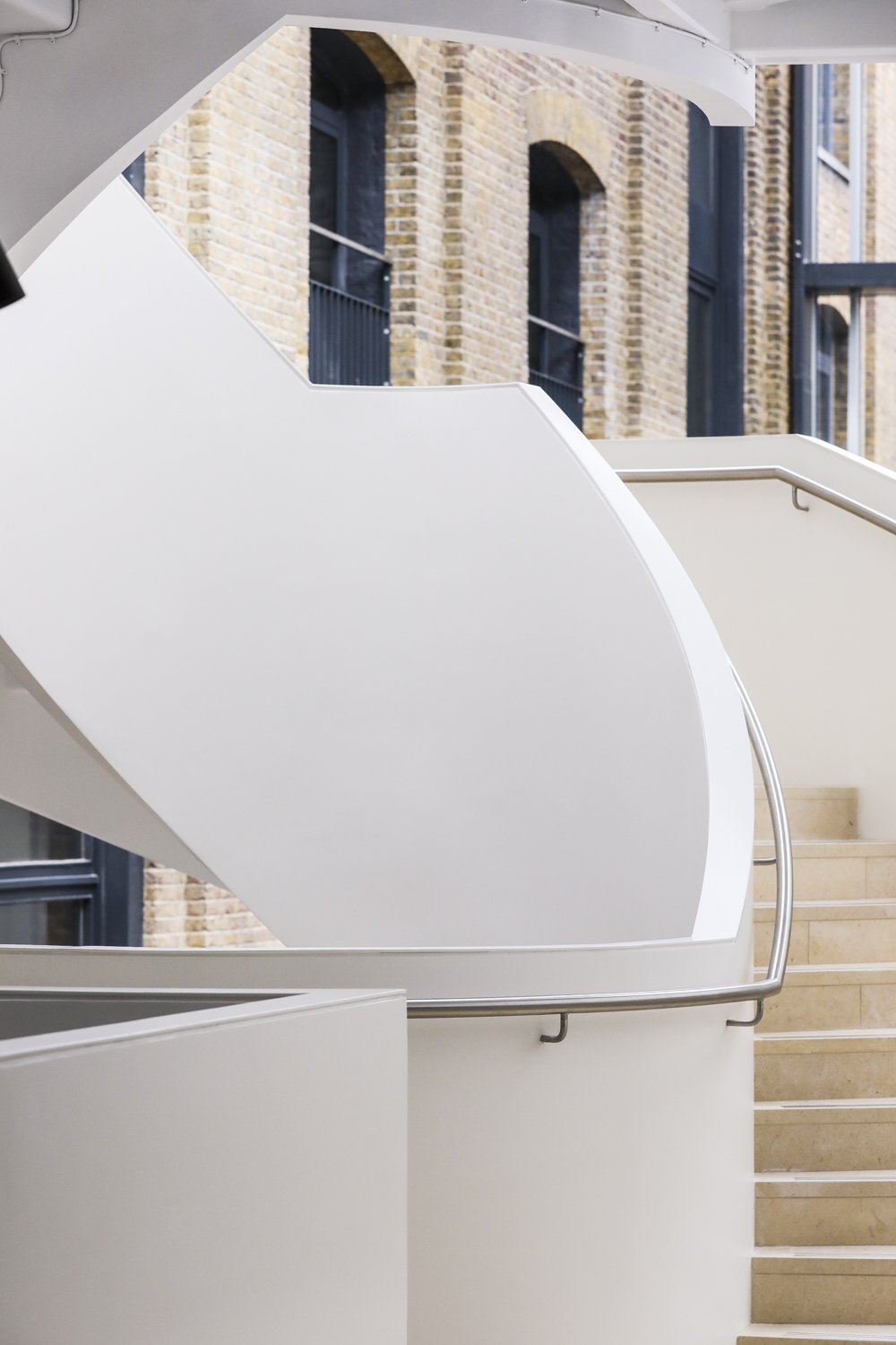 Modern staircase at 10 Union St., perfect for upscale networking events and gatherings.