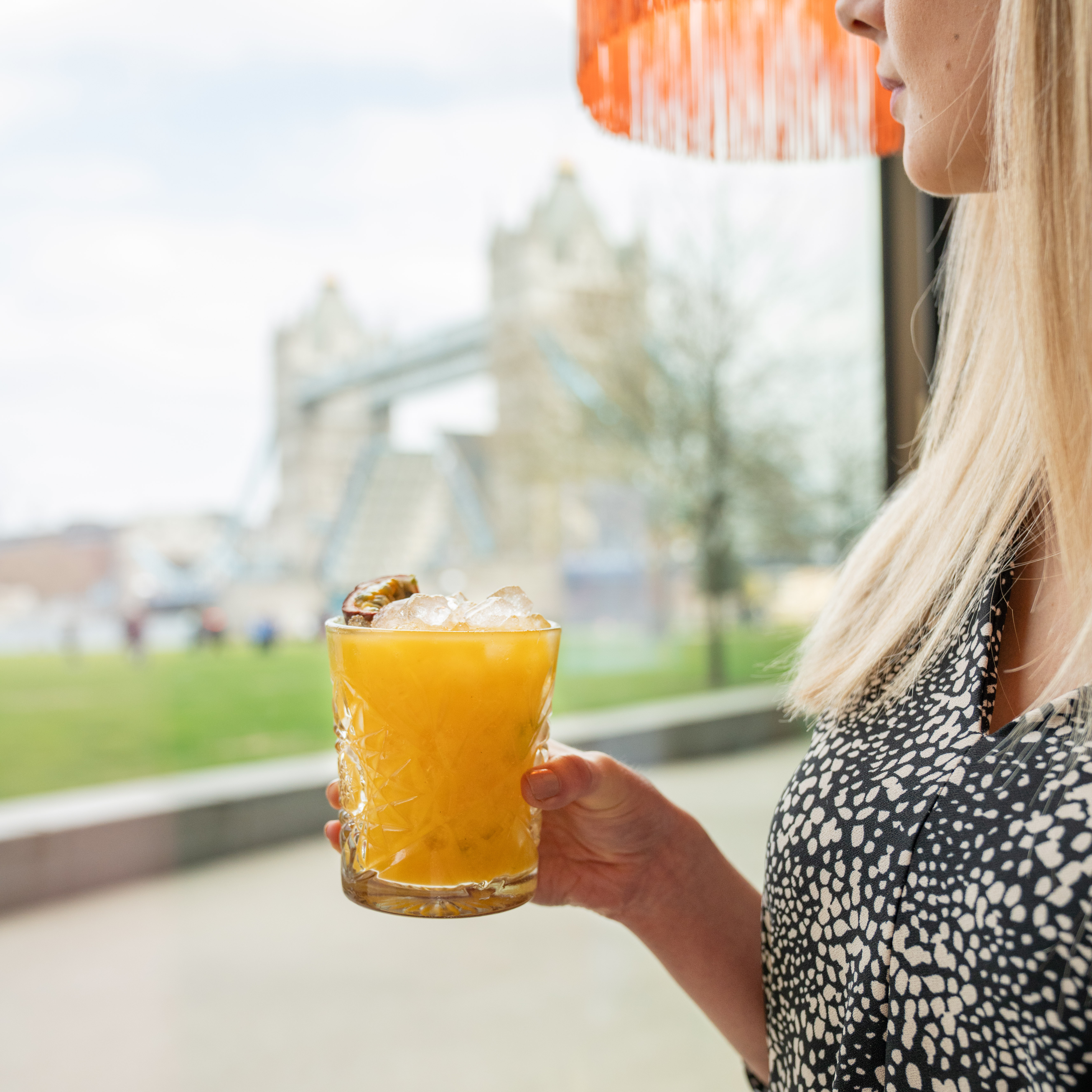 Vibrant cocktail at Temakinho Tower Bridge, ideal for networking events and social gatherings.