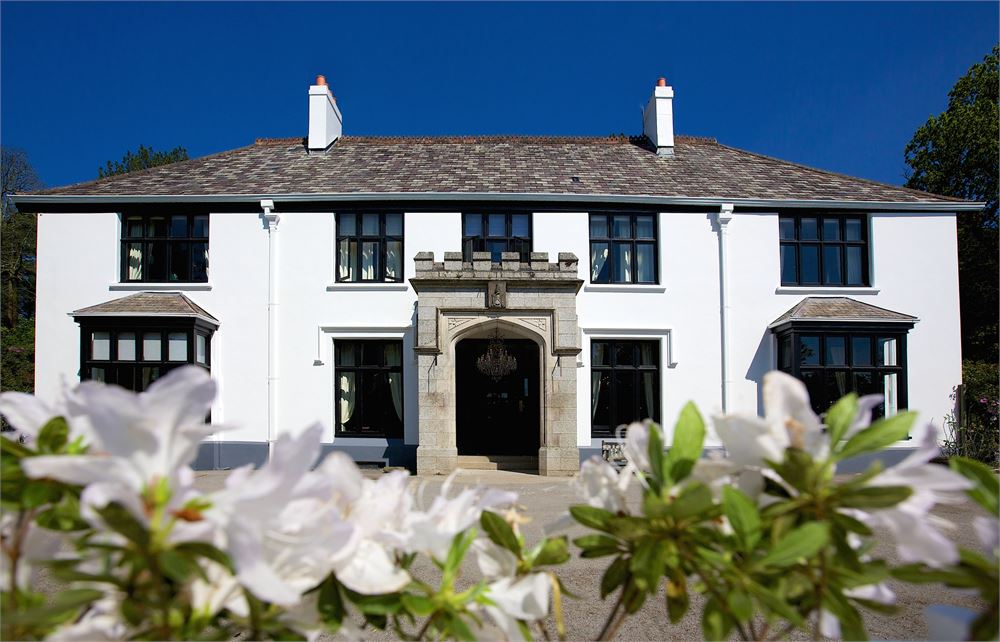 Elegant Glazebrook House venue with large windows for meetings and events.