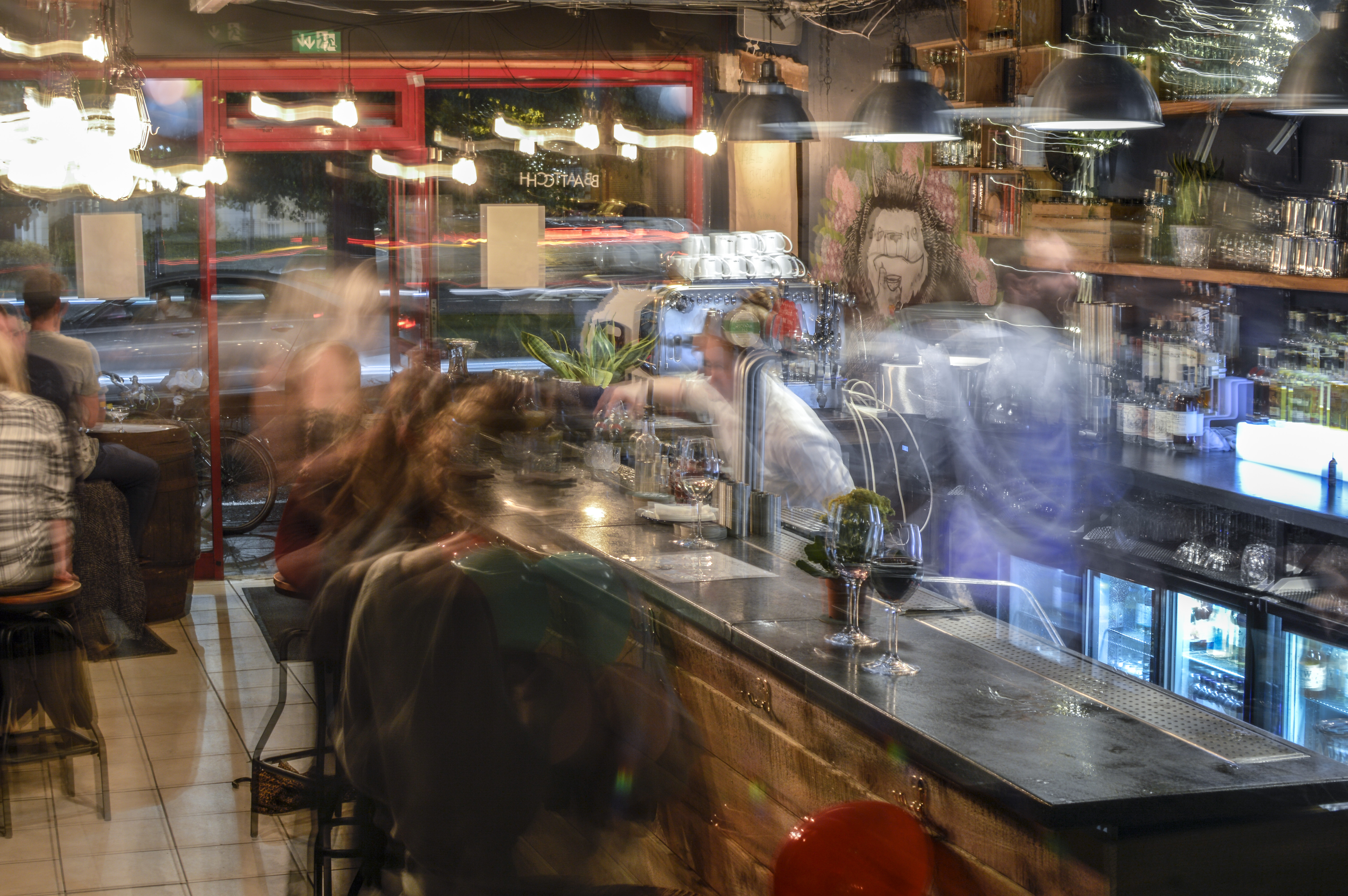 Vibrant BATCH Cocktail Bar scene with warm lighting for networking events and social gatherings.