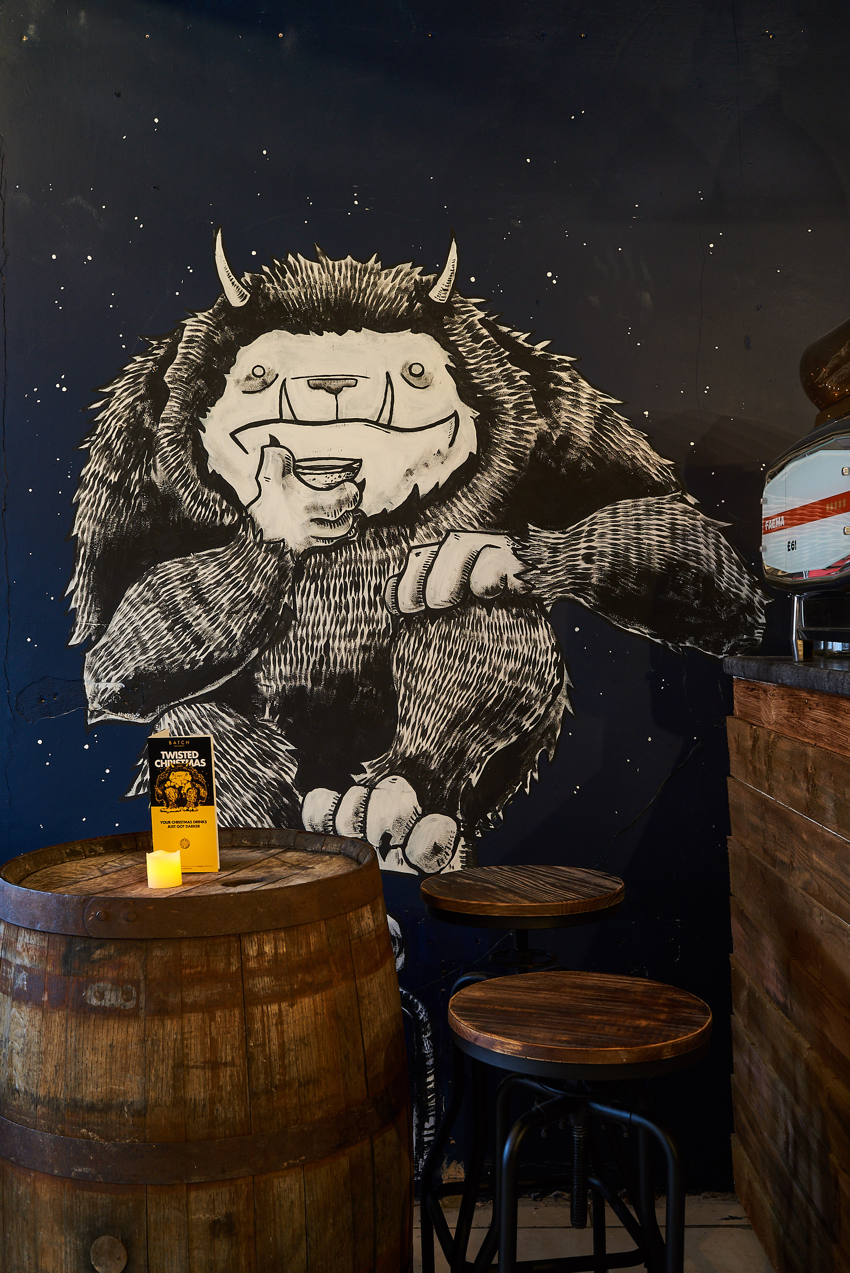 Vibrant bear mural at BATCH Cocktail Bar, perfect for events and gatherings.