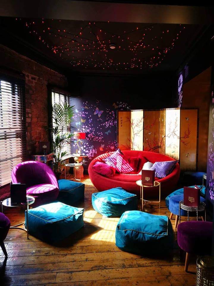 Stylish lounge in Stag and Antelope, perfect for networking events with vibrant decor.