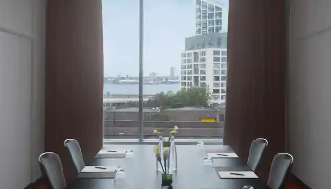 Canning meeting room at Radisson Blu, Liverpool with waterfront view for corporate events.
