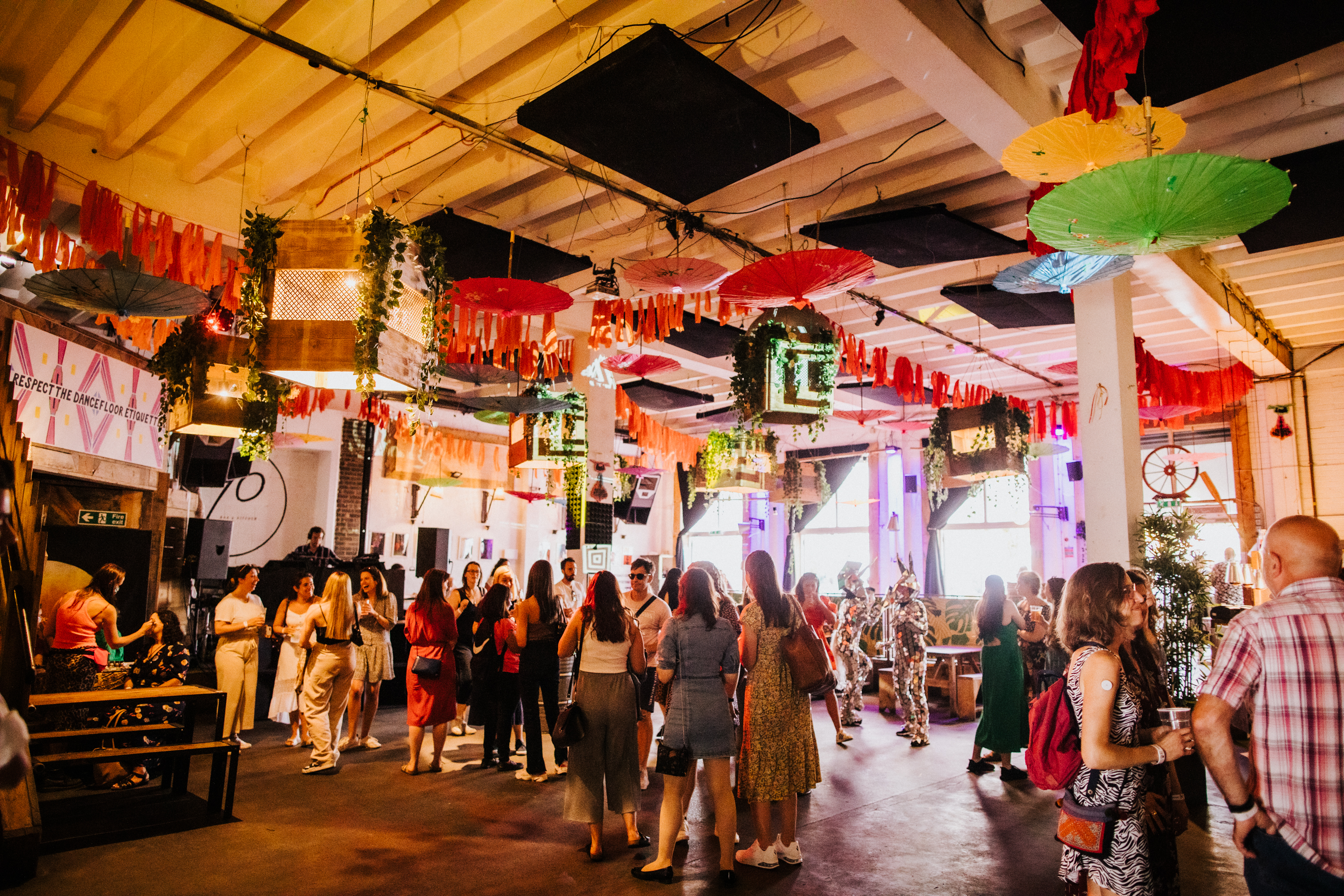 Vibrant event space at 90 Bar & Kitchen with colorful decor for social gatherings.