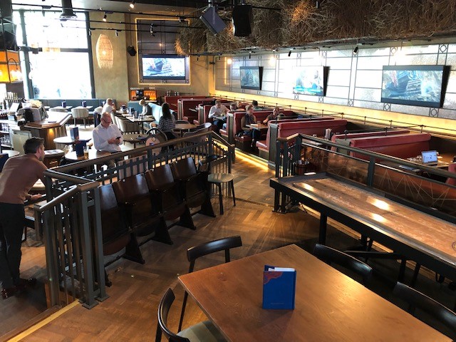 Spacious Sports Lounge in Westwood, ideal for networking events and presentations.