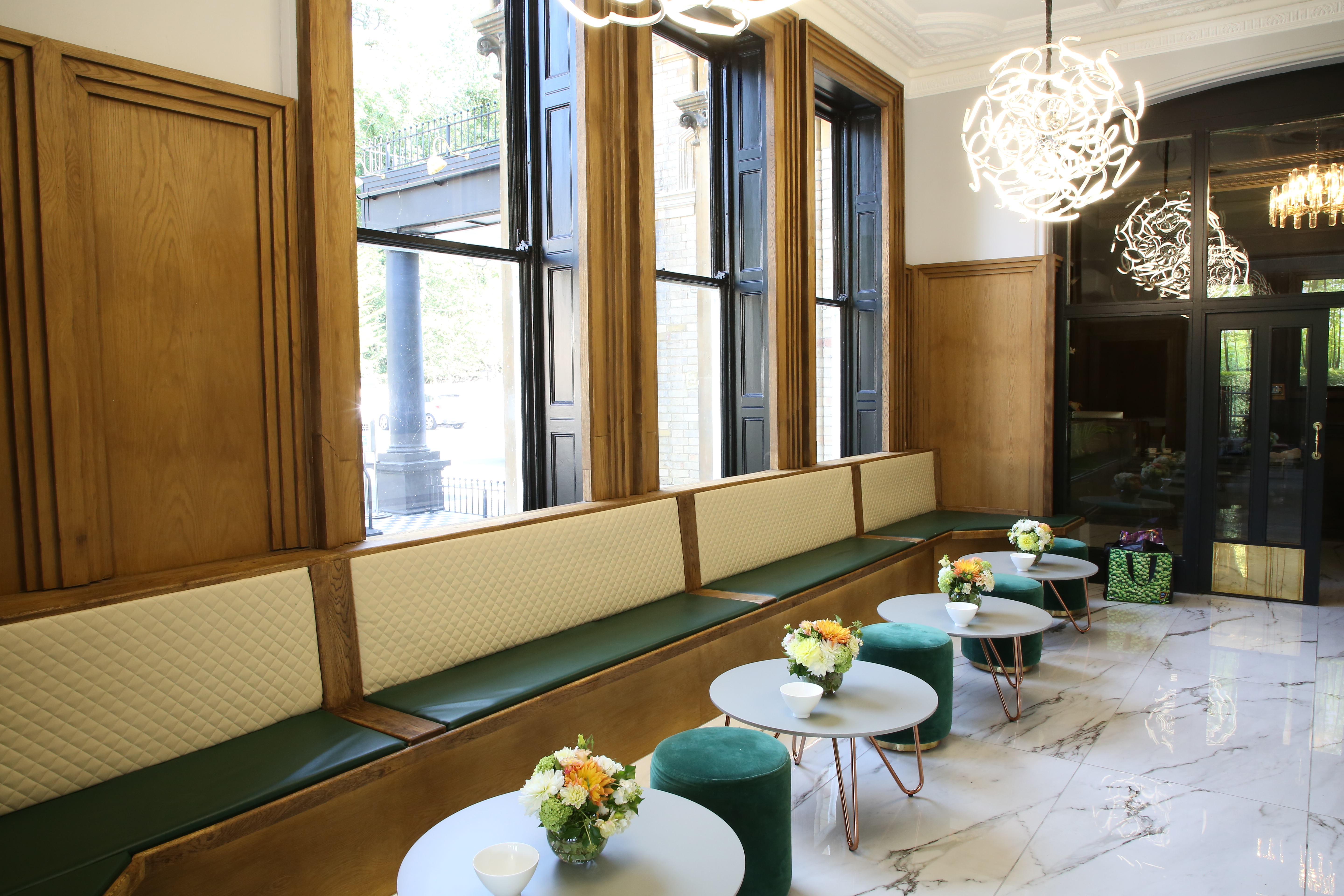 Hilltop Bar at Ponsbourne Park Hotel, elegant seating for networking events.