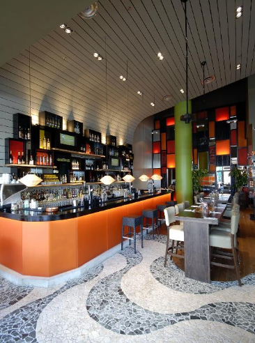 Modern bar and dining area at Las Iguanas Lakeside, ideal for networking events and meetings.