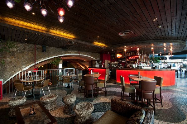 Stylish Las Iguanas venue in London with modern bar, ideal for events and gatherings.