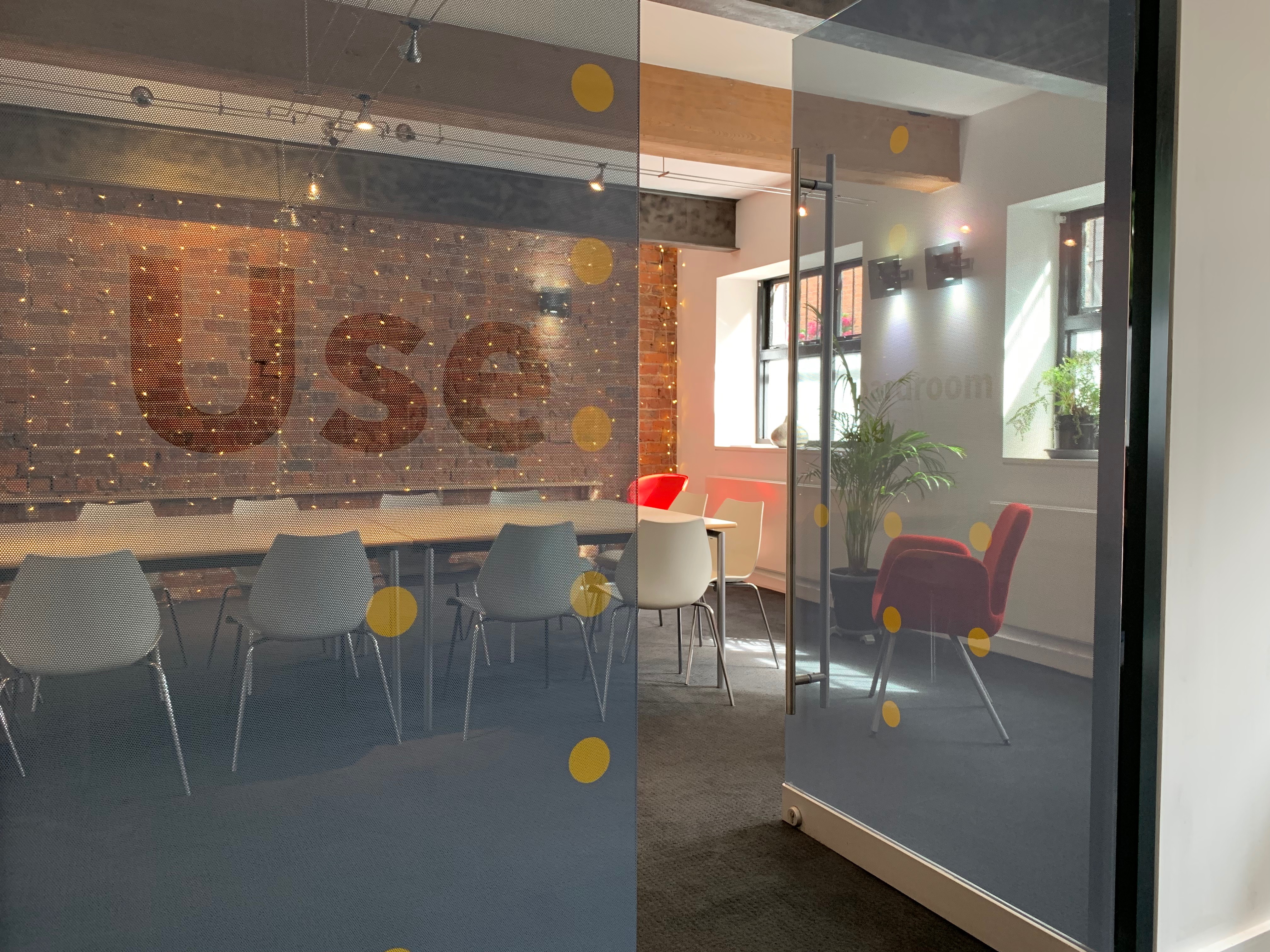 Modern Boardroom One with stylish table, ideal for meetings and brainstorming sessions.