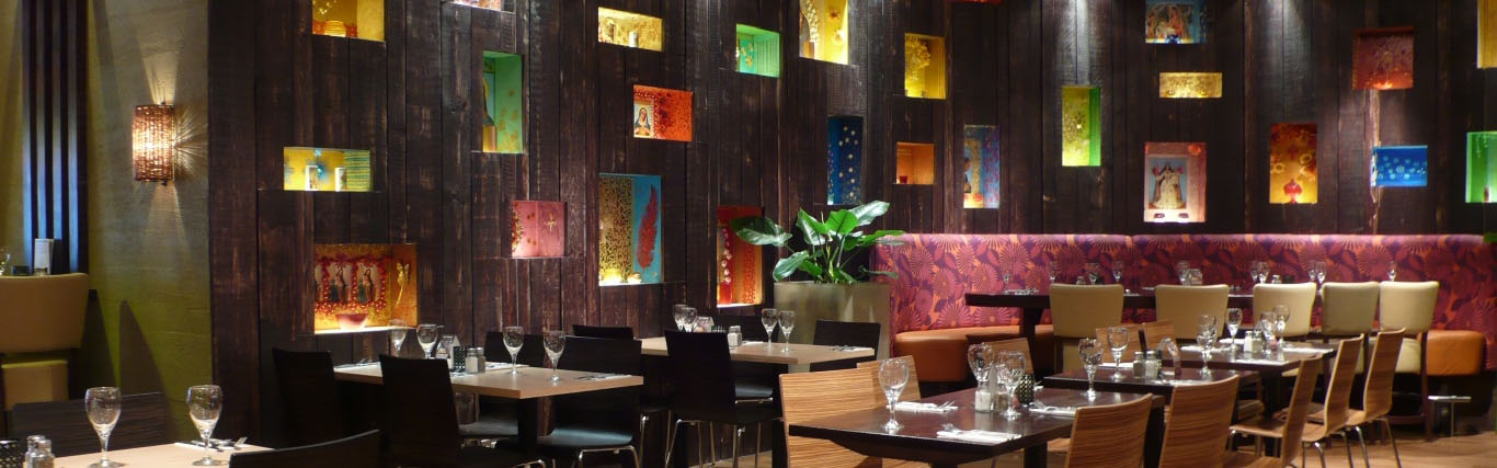 Vibrant Las Iguanas Manchester venue with colorful decor for events and dining.