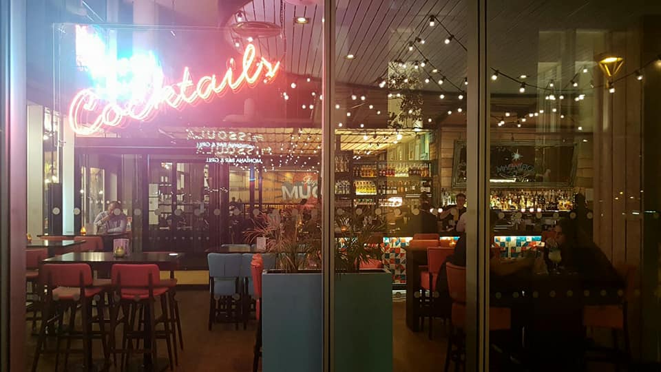 Vibrant Las Iguanas venue with stylish bar, perfect for social events and gatherings.