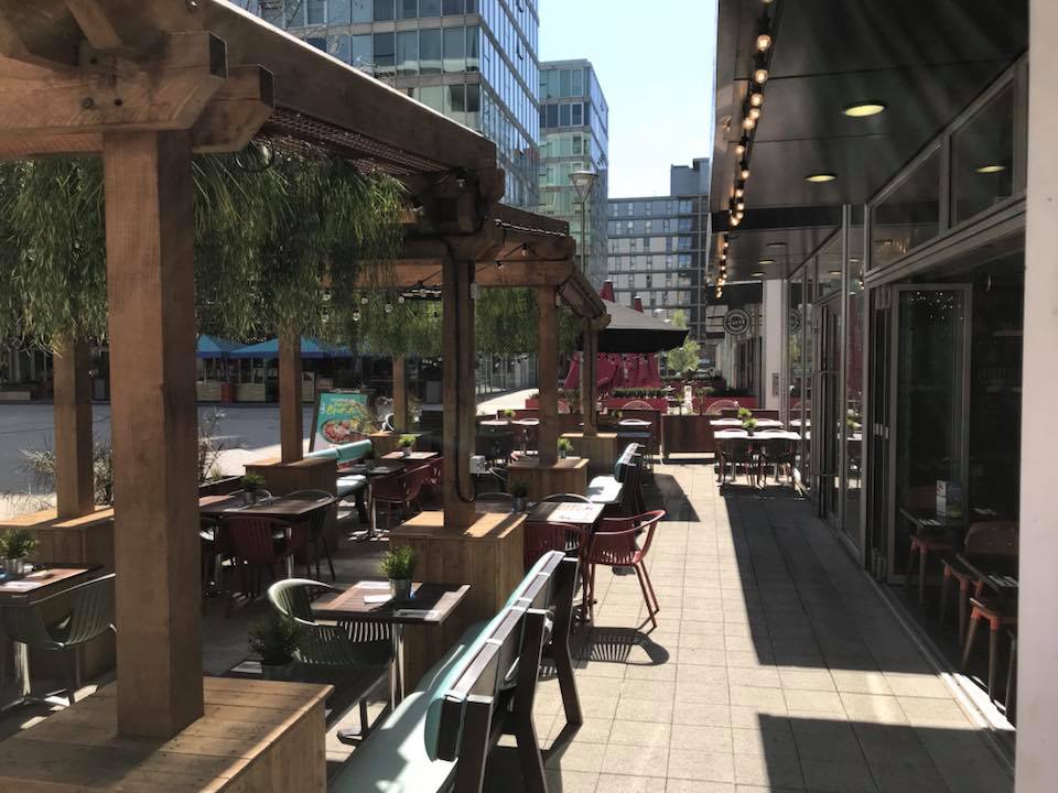 Outdoor dining space at Las Iguanas Milton Keynes, perfect for casual meetings and networking.