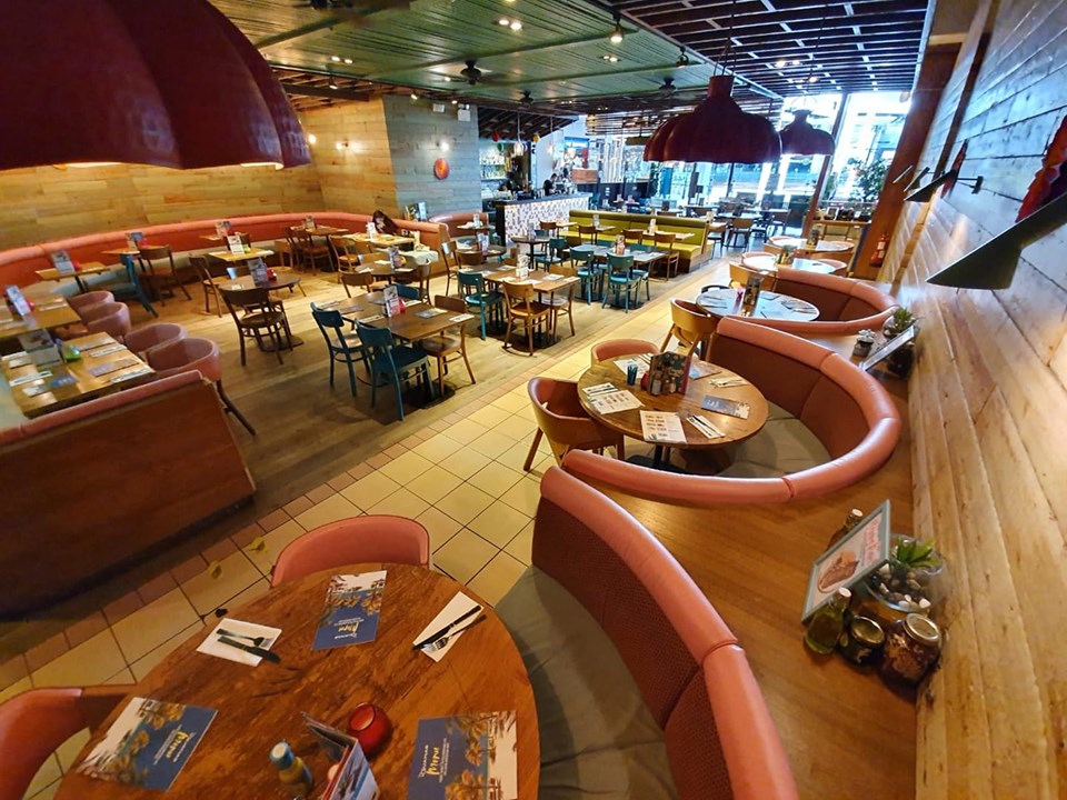 Vibrant dining space at Las Iguanas Sheffield, ideal for casual gatherings and events.