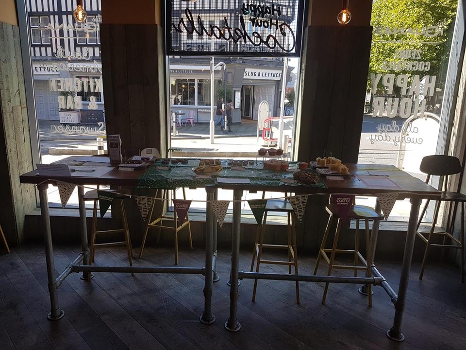 Modern event space in Las Iguanas Swansea with a long table for meetings and networking.