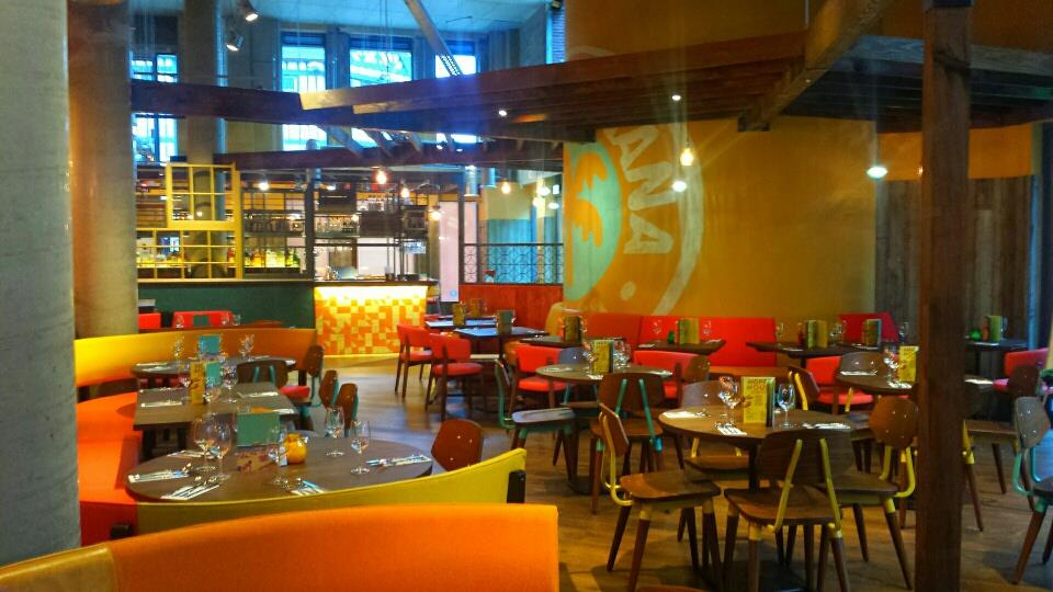Vibrant Las Iguanas Swansea venue with colorful seating for events and gatherings.