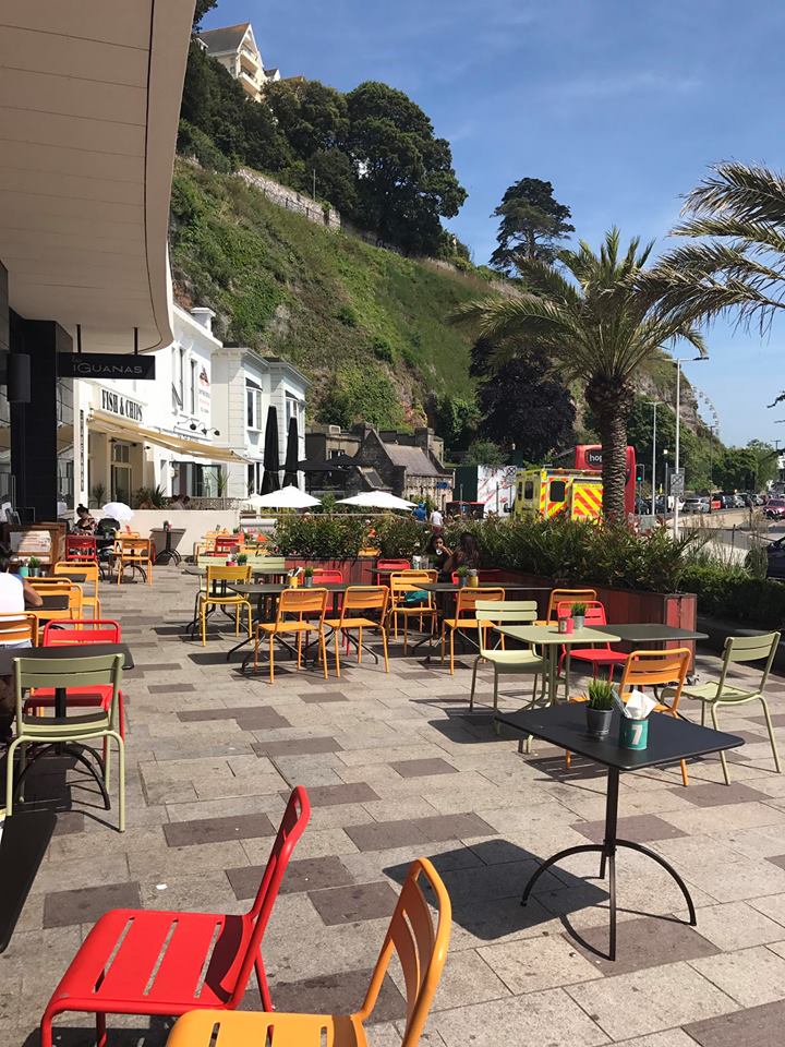 Vibrant outdoor dining area at Las Iguanas Torquay, ideal for casual meetings and events.