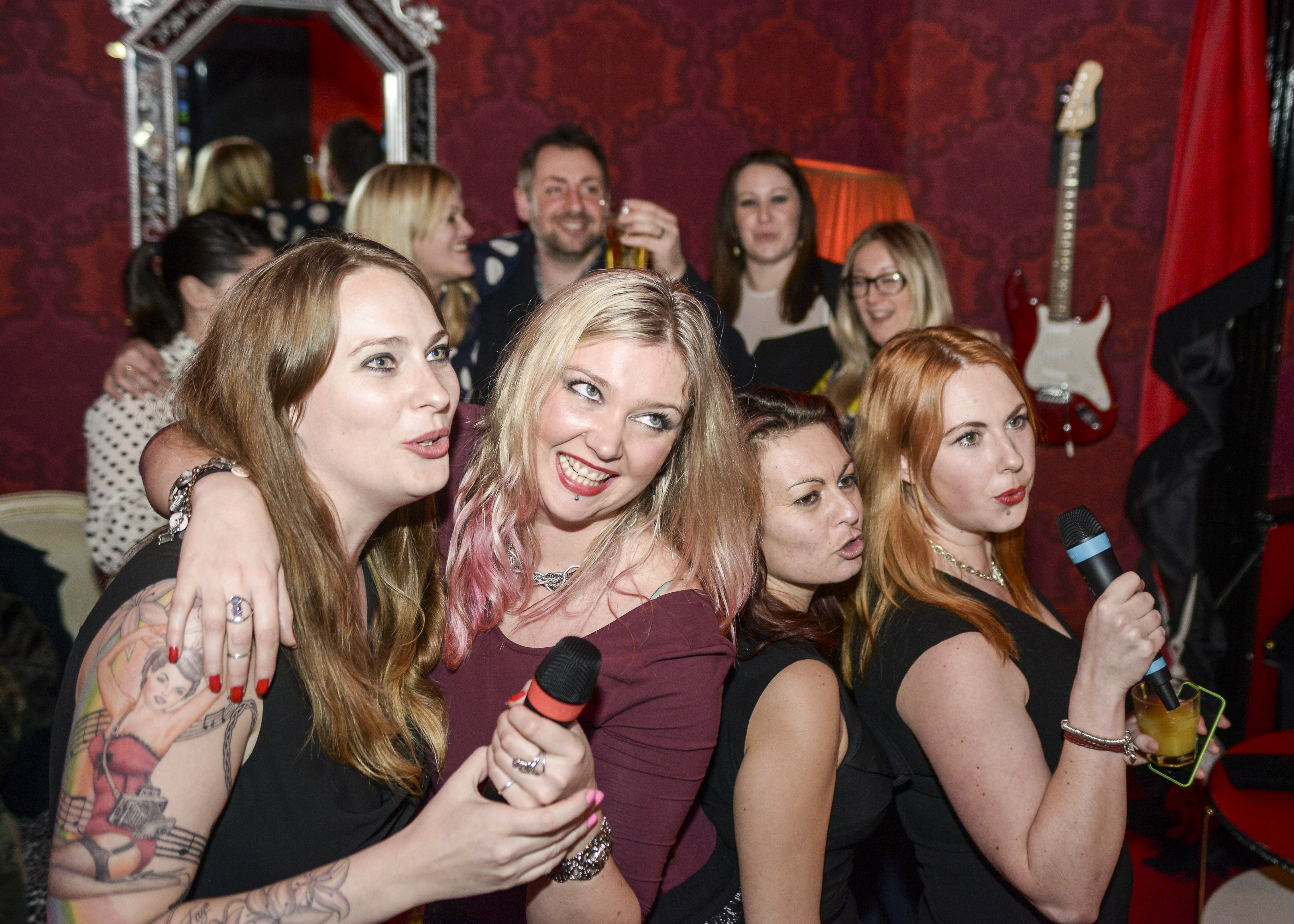 Karaoke event at Hotel Pelirocco with lively attendees enjoying entertainment.