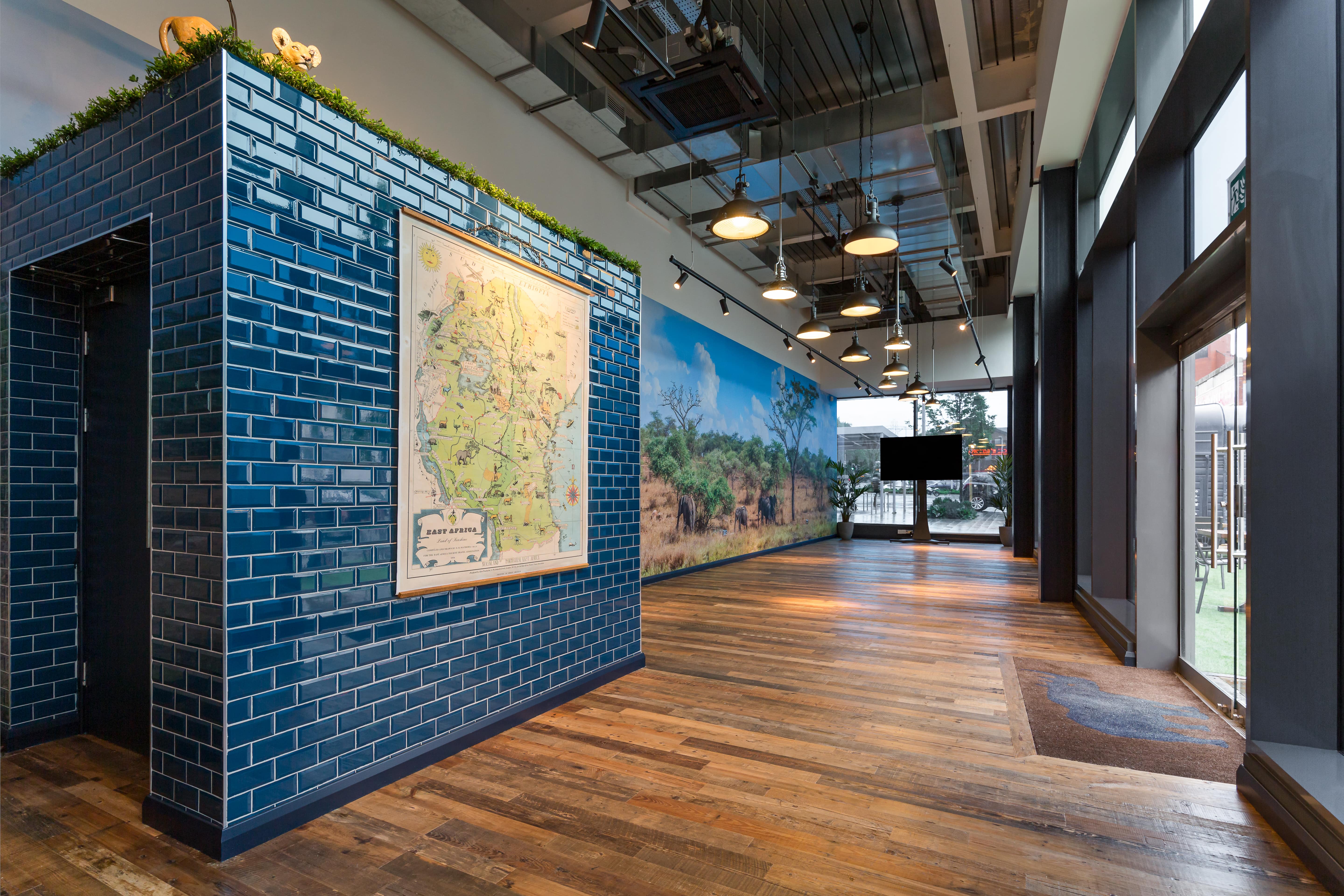 Rowena's Room at The Light Cinema Stockport, blue brick wall, ideal for events and meetings.