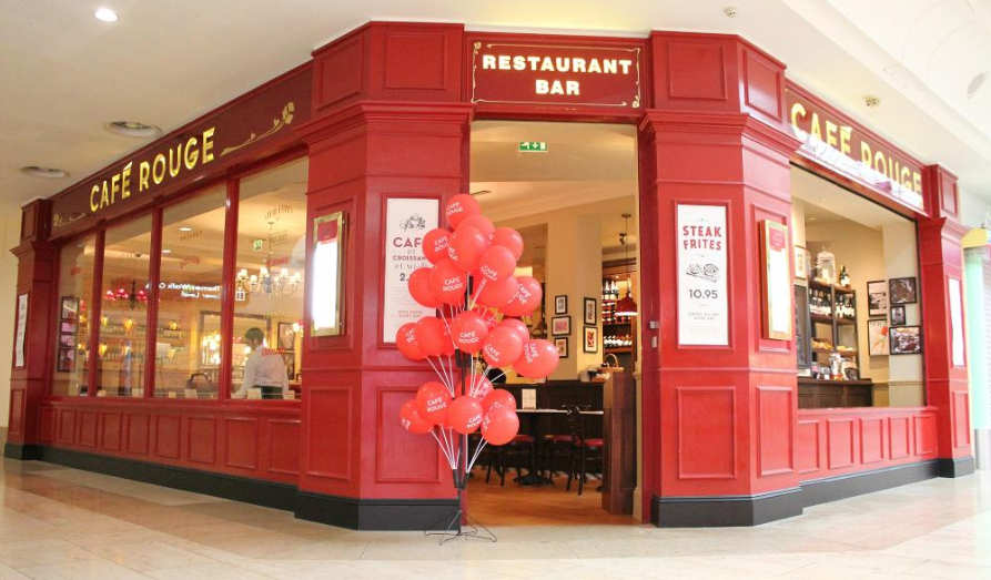 Vibrant Café Rouge Bluewater entrance, perfect for casual meetings and social events.