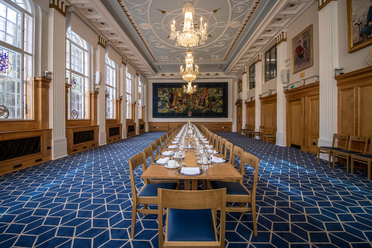 Elegant banquet hall with high ceilings, ideal for formal events and meetings.