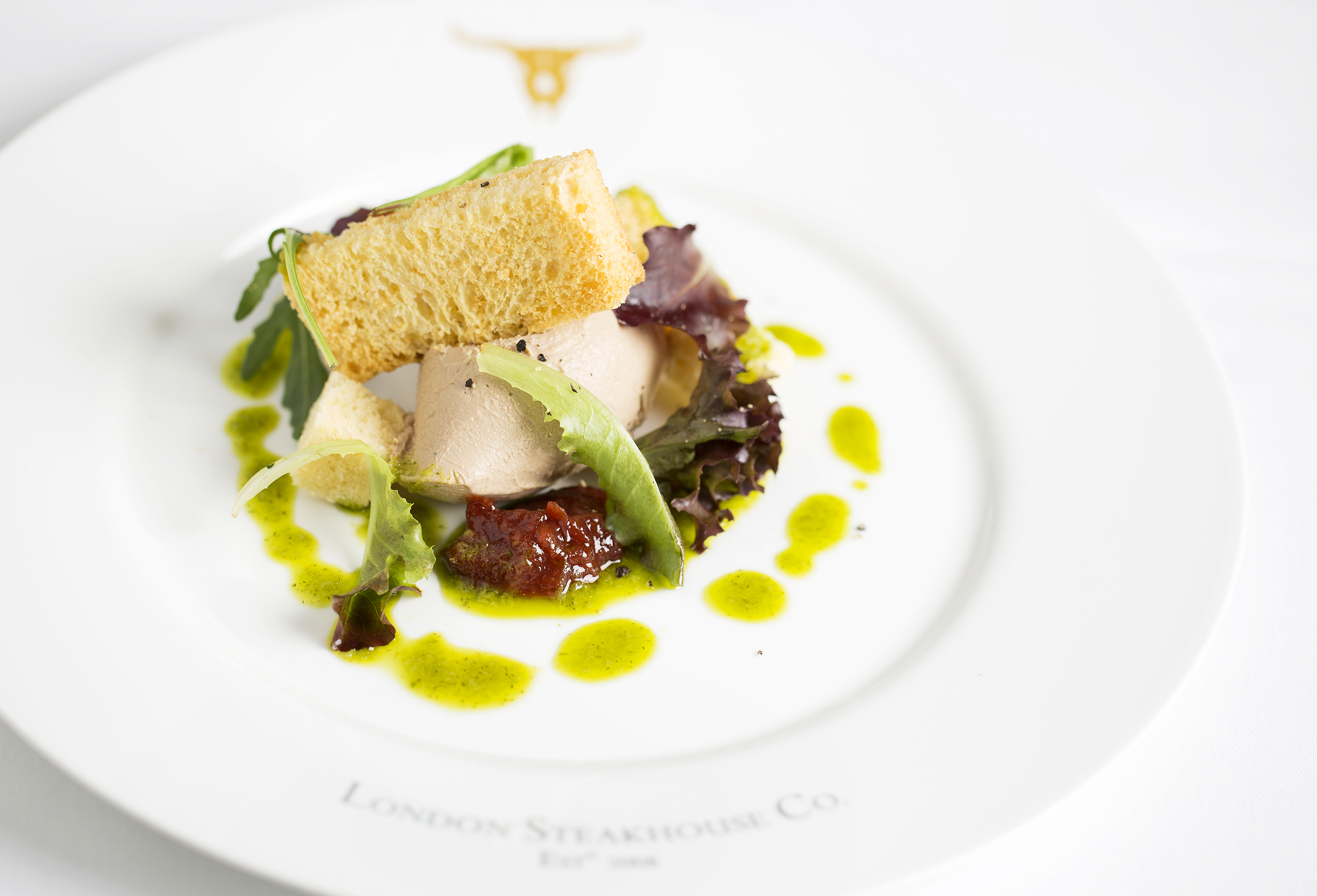 Elegant plated dish at London Steakhouse Company for upscale event catering.