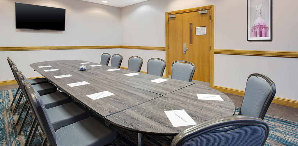 Meeting Room 1 at Jurys Inn Liverpool with oval table, ideal for corporate meetings.