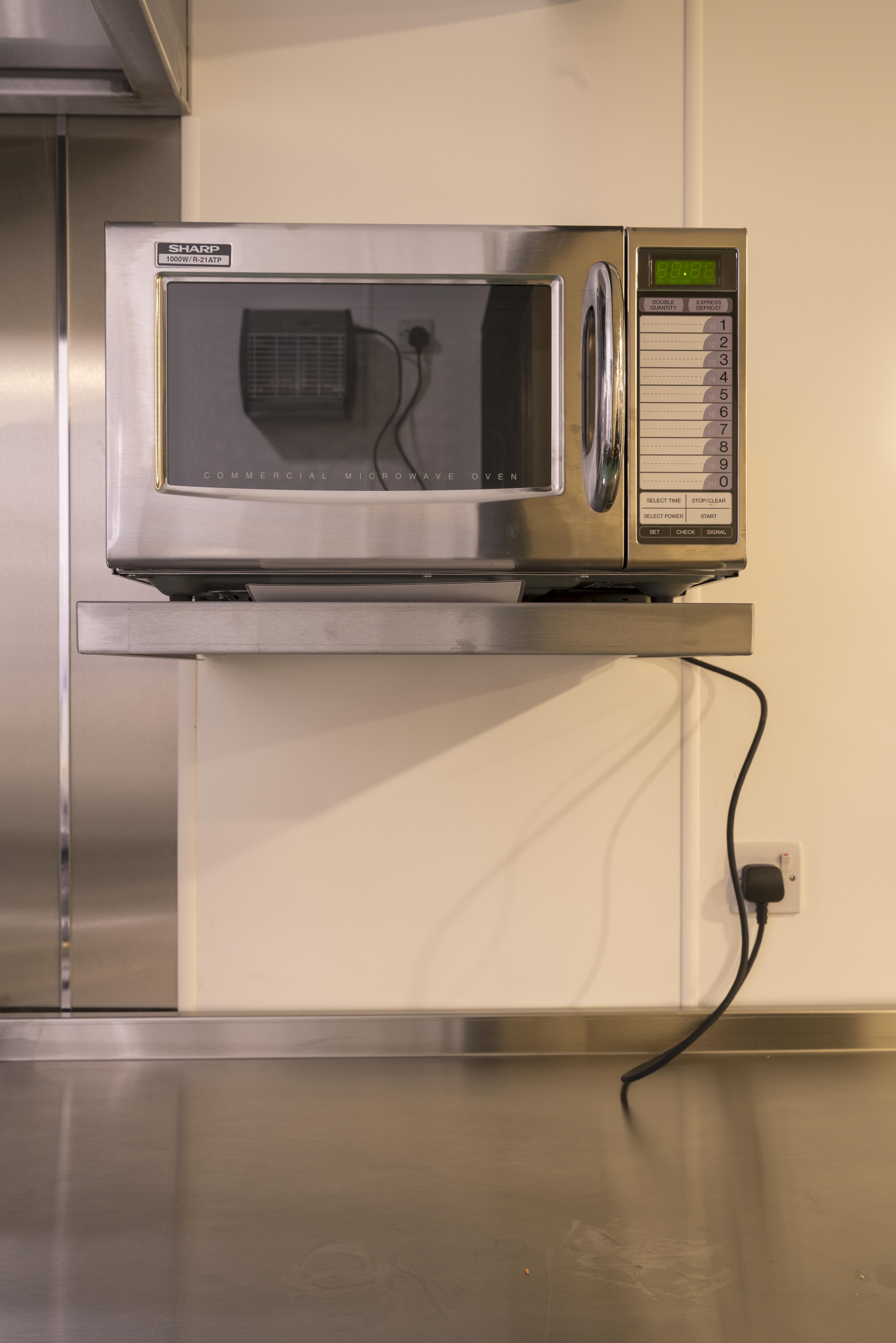 Commercial kitchen microwave in Unity Islington for convenient event catering.