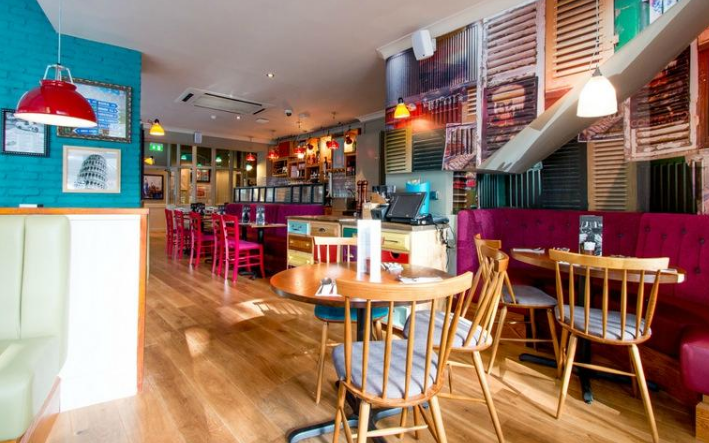 Vibrant Bella Italia venue in London, perfect for casual meetings and events.