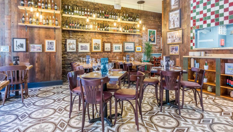 Charming Bella Italia venue with warm wood accents for intimate gatherings and corporate events.