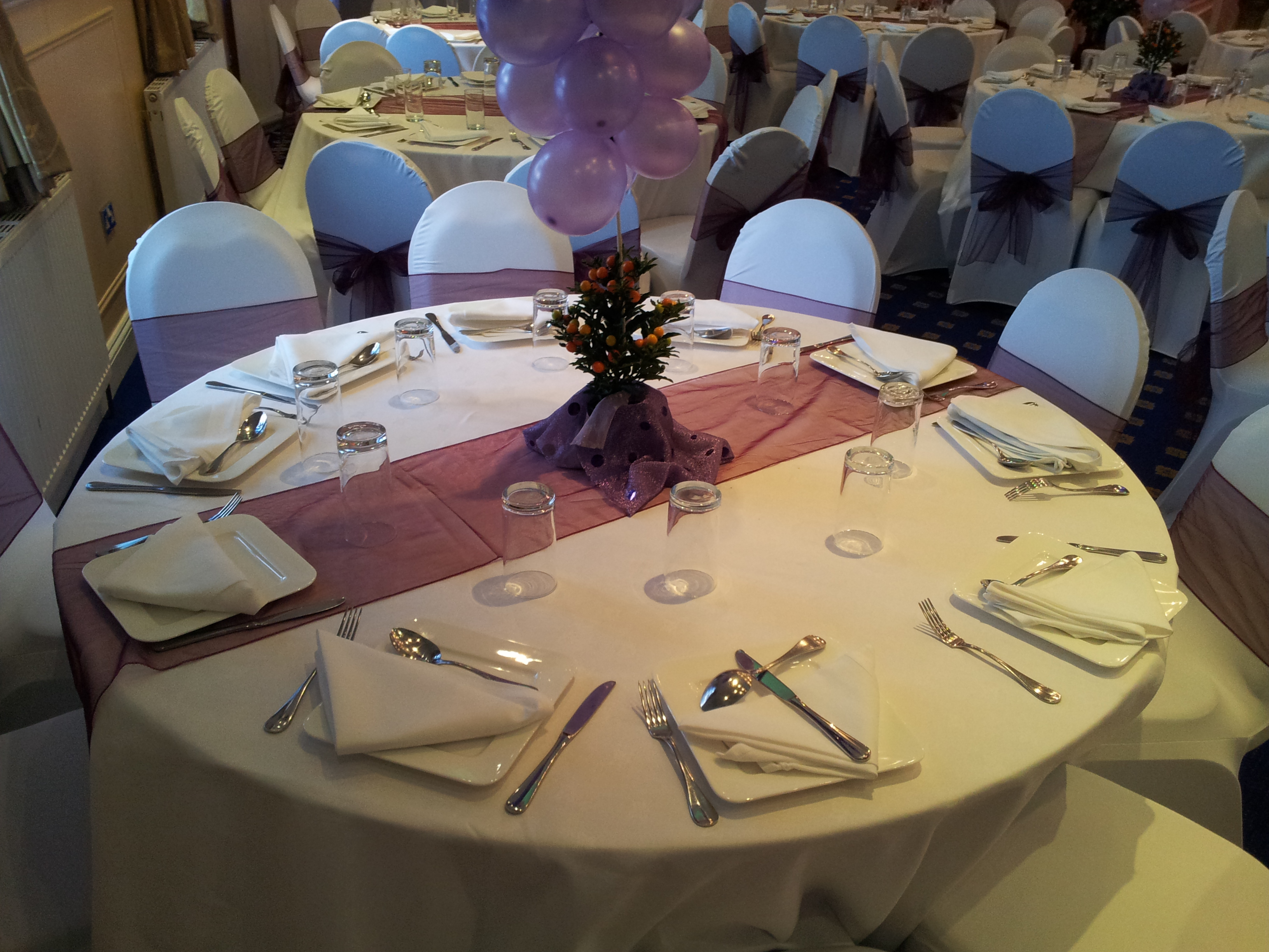 Elegant round table setting in Ealing Banqueting Suite for weddings and formal events.