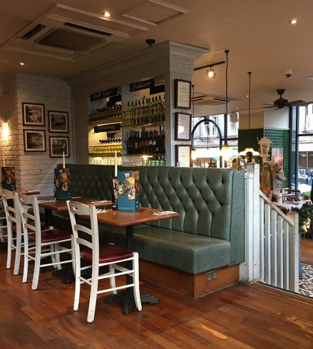 Cozy dining space in Bella Italia Edinburgh, perfect for intimate gatherings and events.