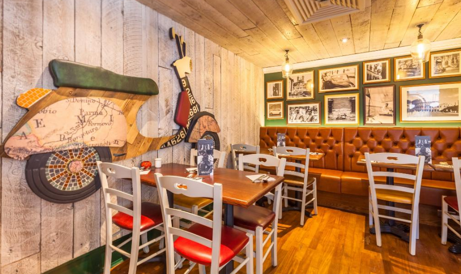 Cozy dining space at Bella Italia Edinburgh, perfect for intimate meetings and events.