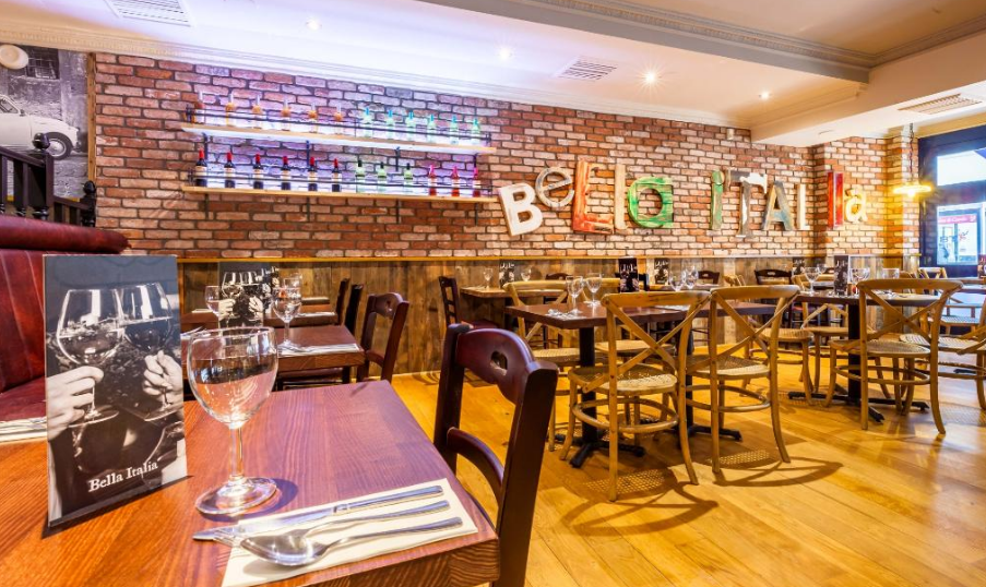 Charming Bella Italia venue with rustic decor for intimate gatherings and corporate events.