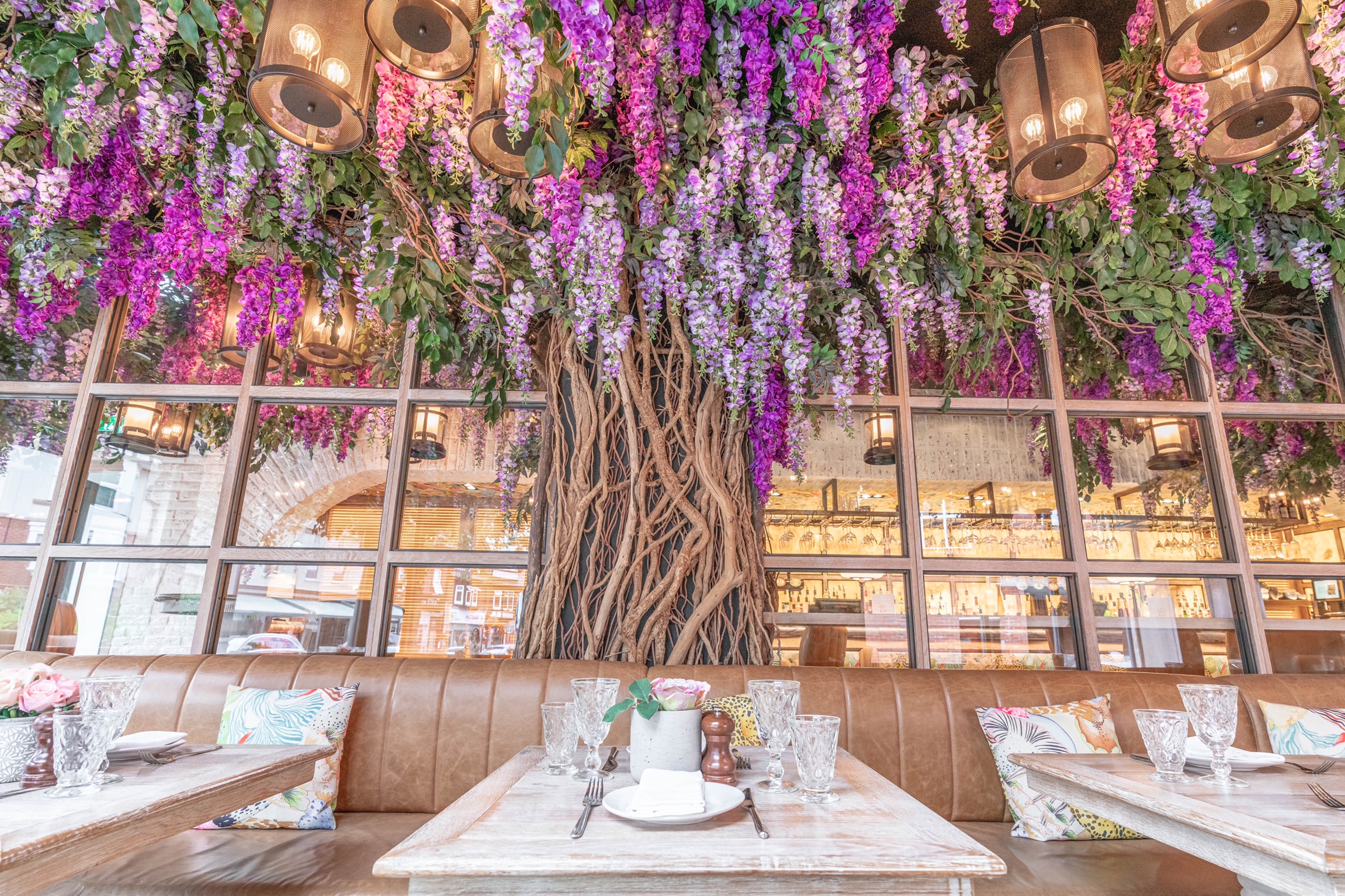 Elegant Blossom Room with wisteria, perfect for intimate gatherings and upscale events.