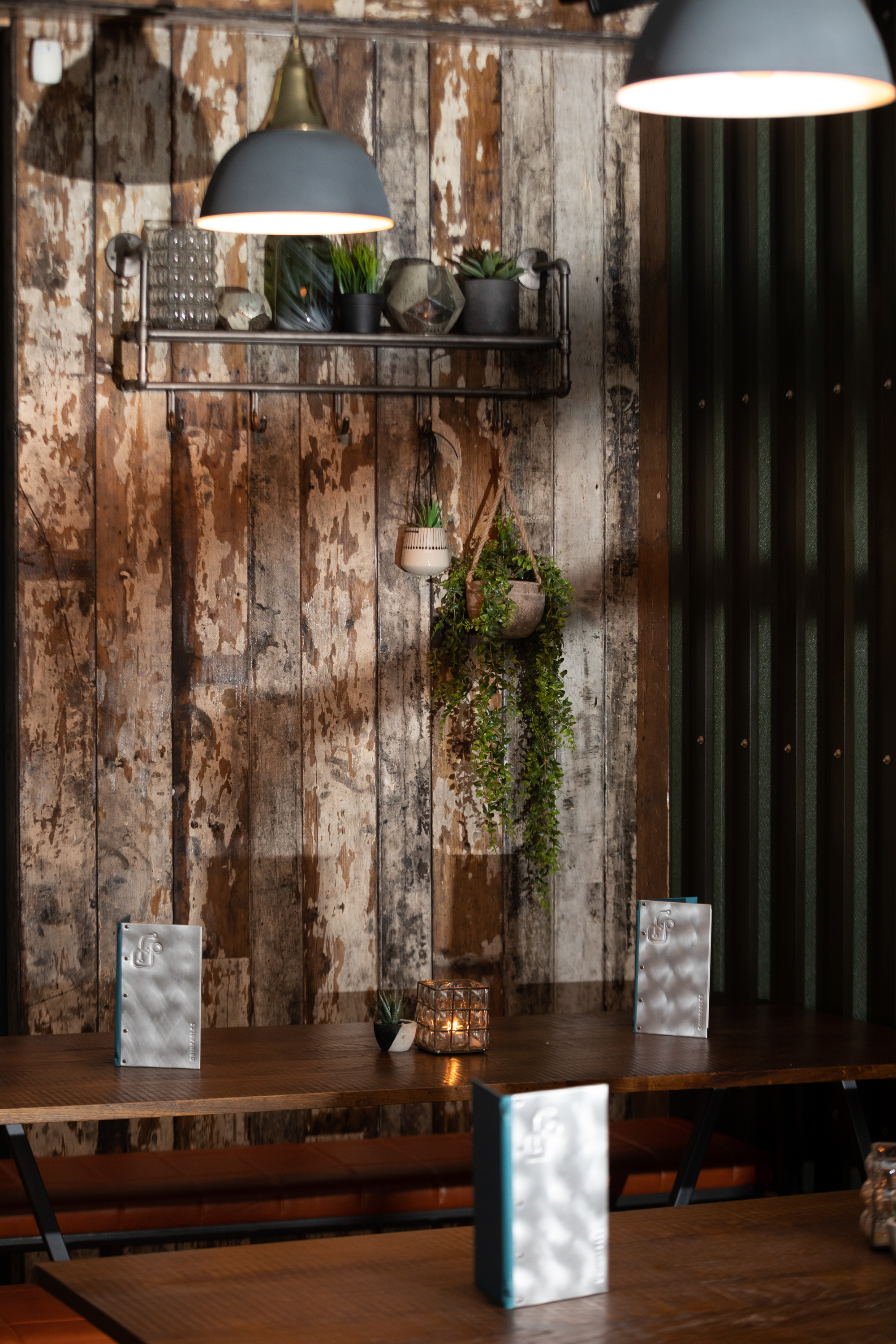 Rustic restaurant with weathered wood, perfect for intimate events and gatherings.