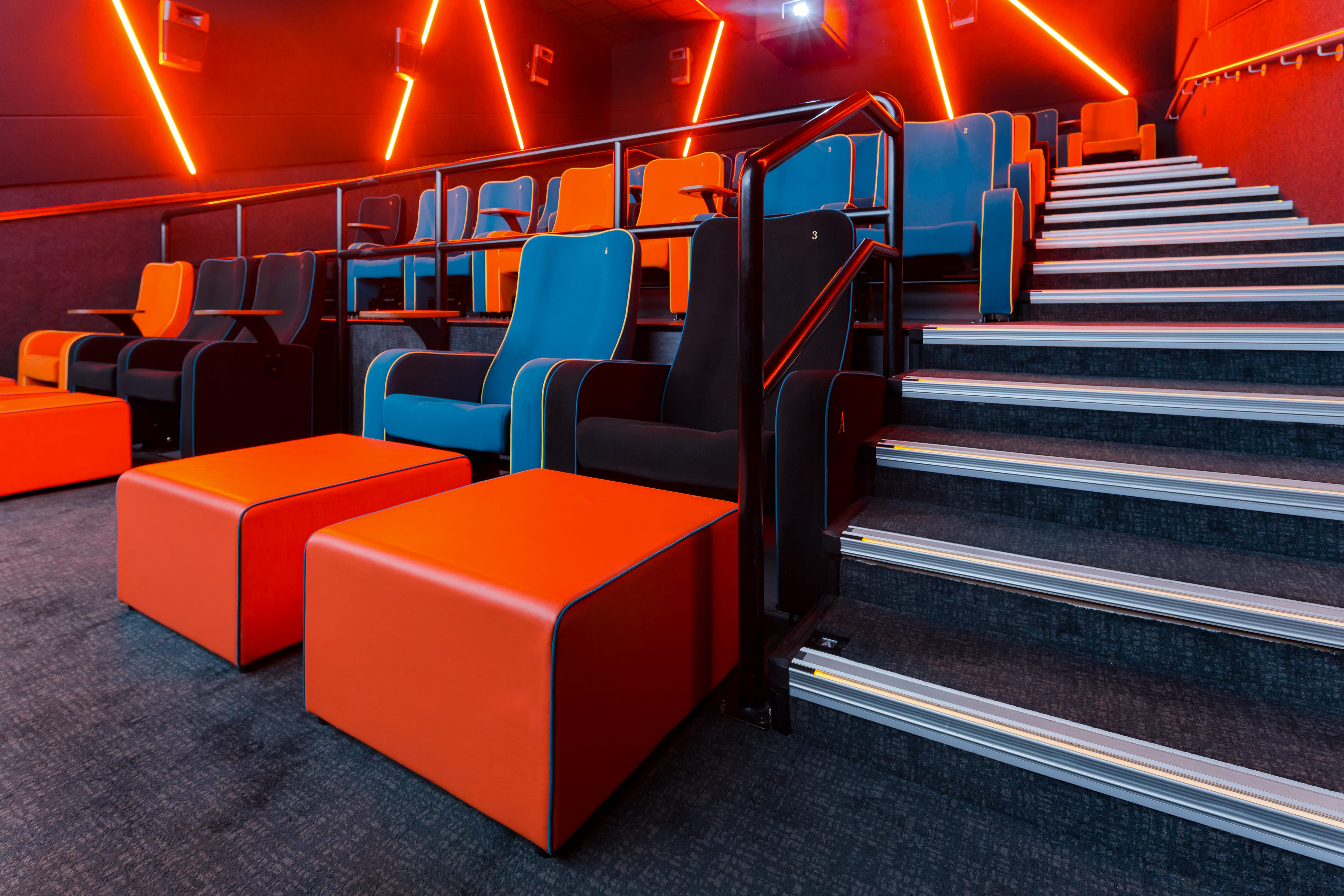 Modern event space with vibrant seating at The Light Cinema Stockport for presentations.