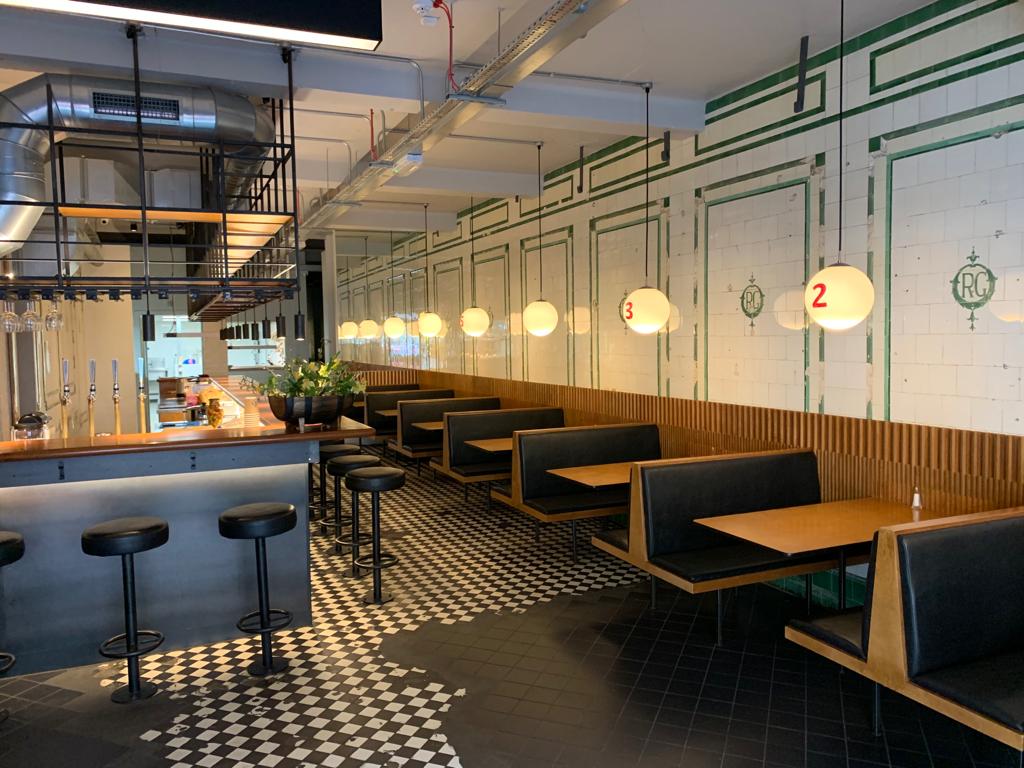 Modern venue in Hoxton with cozy seating, ideal for networking events and gatherings.