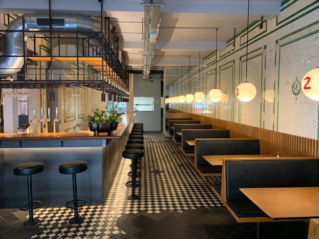 Modern venue in Hoxton with sleek bar, ideal for casual meetings and events.