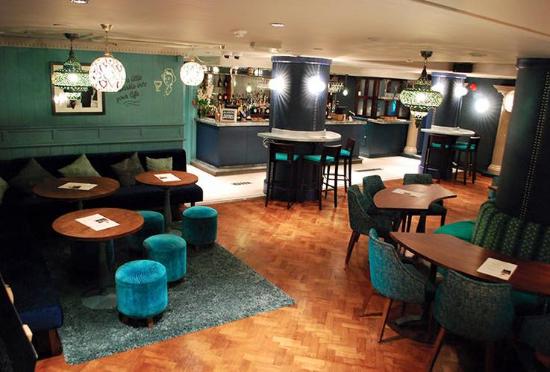 Stylish venue with cozy seating for small meetings and networking events.