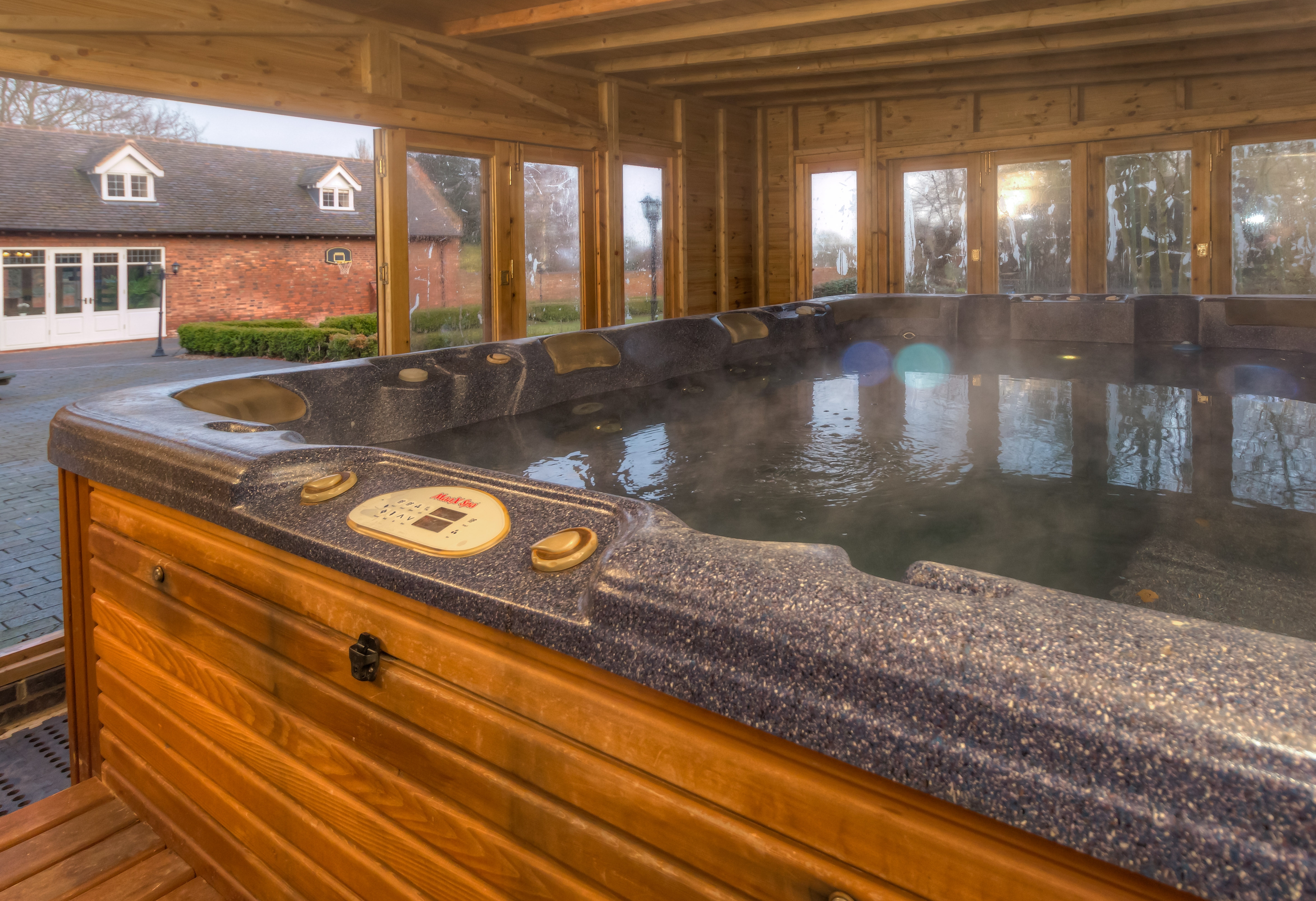 Luxurious hot tub in private estate for corporate retreats and team-building events.