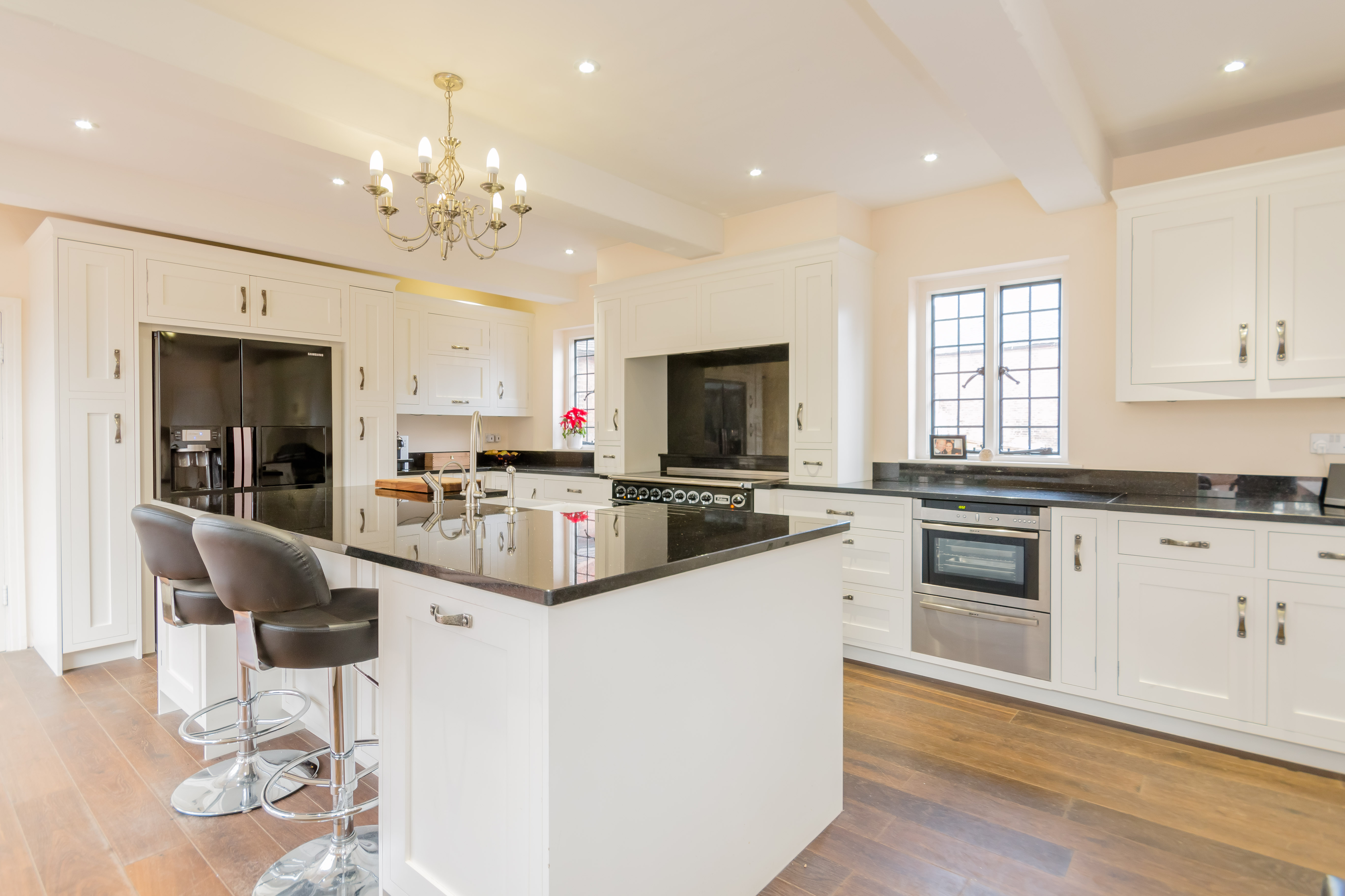 Modern kitchen in luxury estate, perfect for culinary events and intimate gatherings.