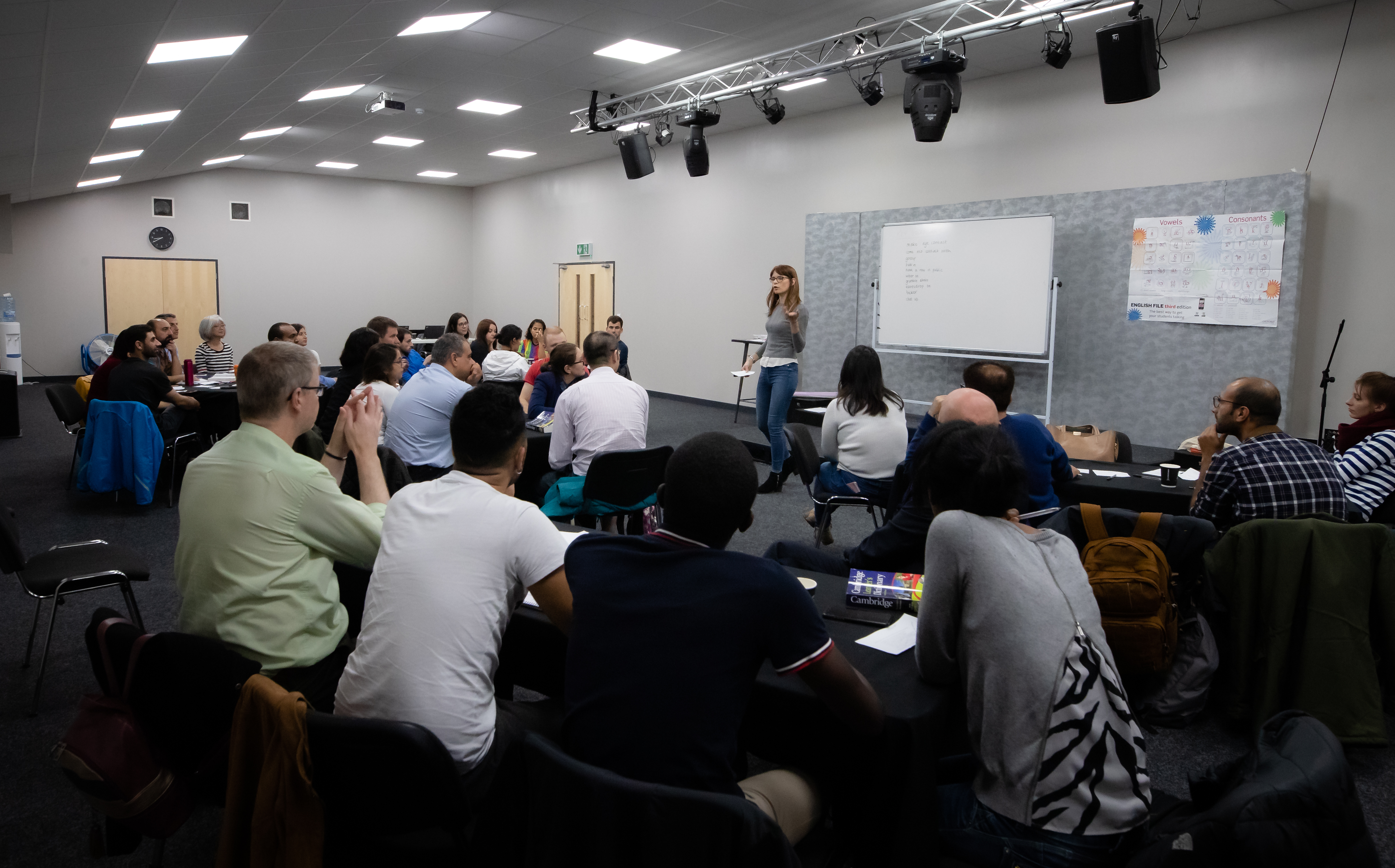 Dynamic meeting room with whiteboards for workshops and training sessions.