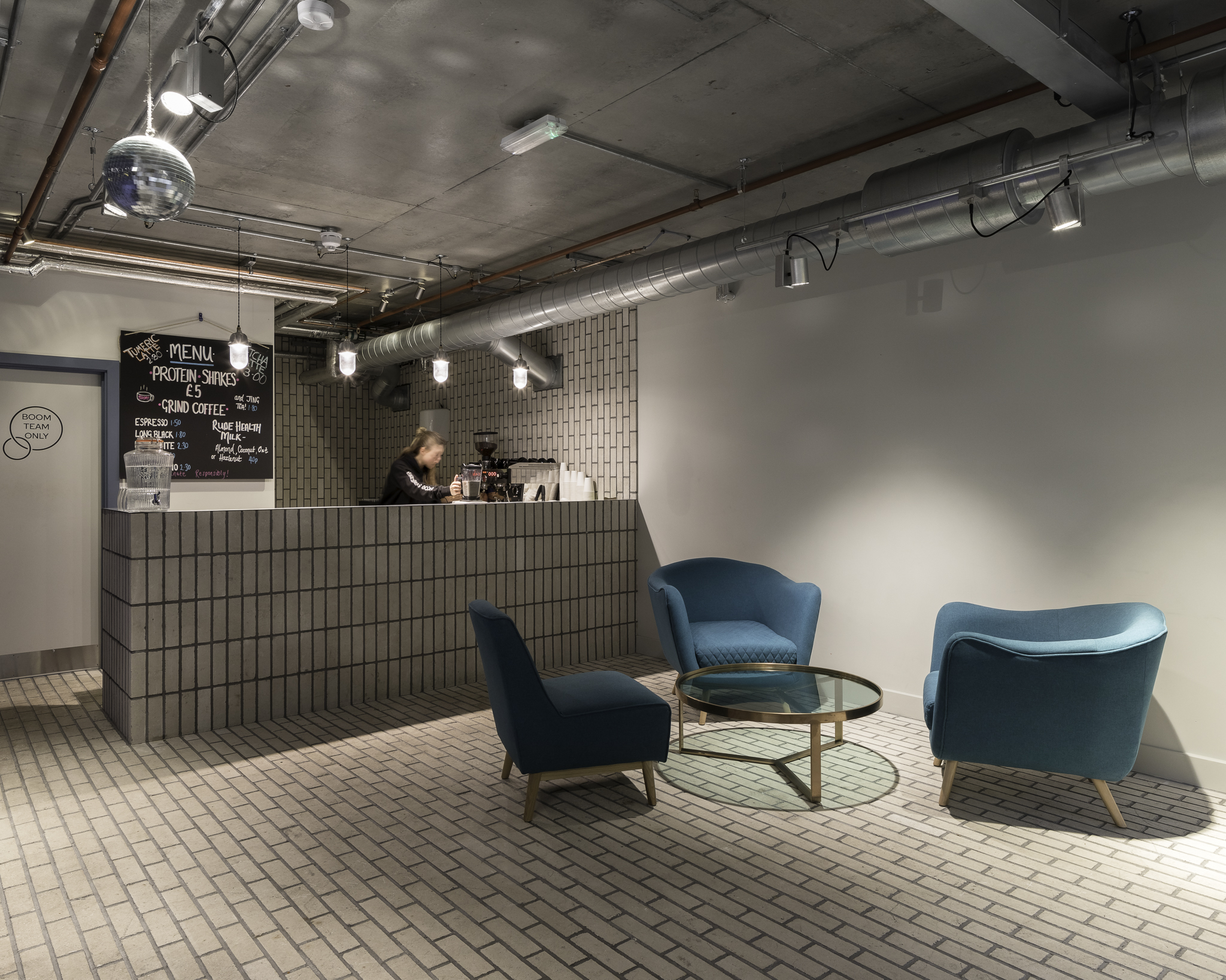 Modern reception area in Boom Cycle Battersea, ideal for meetings and events.