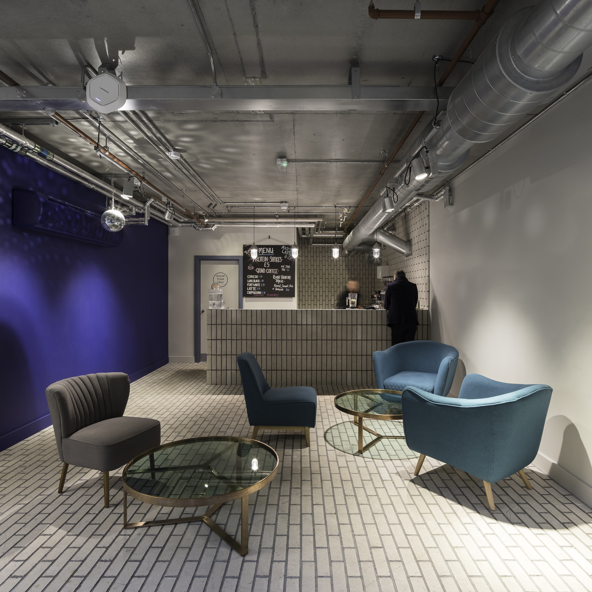 Modern reception area with stylish seating for events at Boom Cycle Battersea.